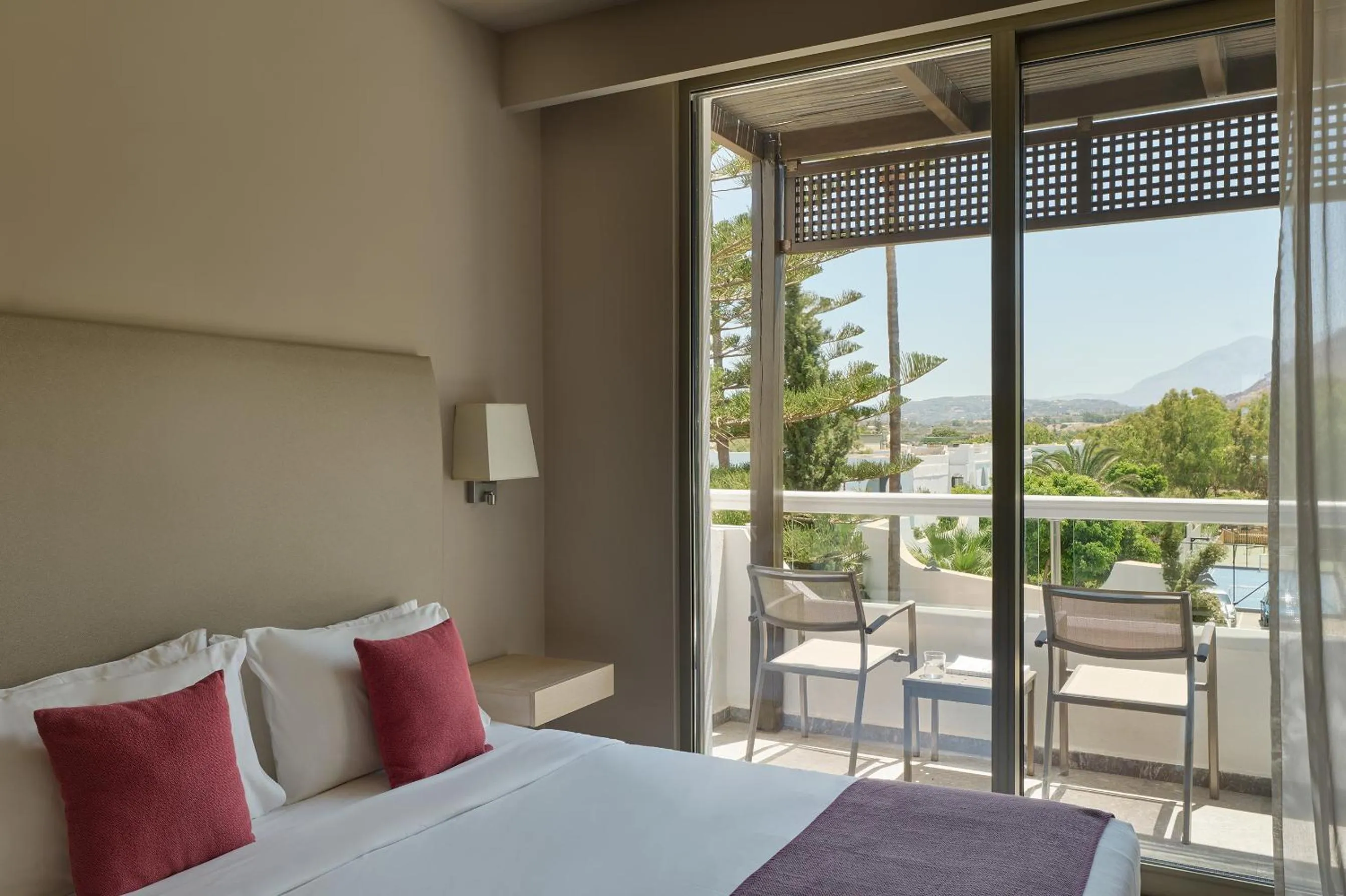 Bed in Atlantica Akti Zeus Hotel