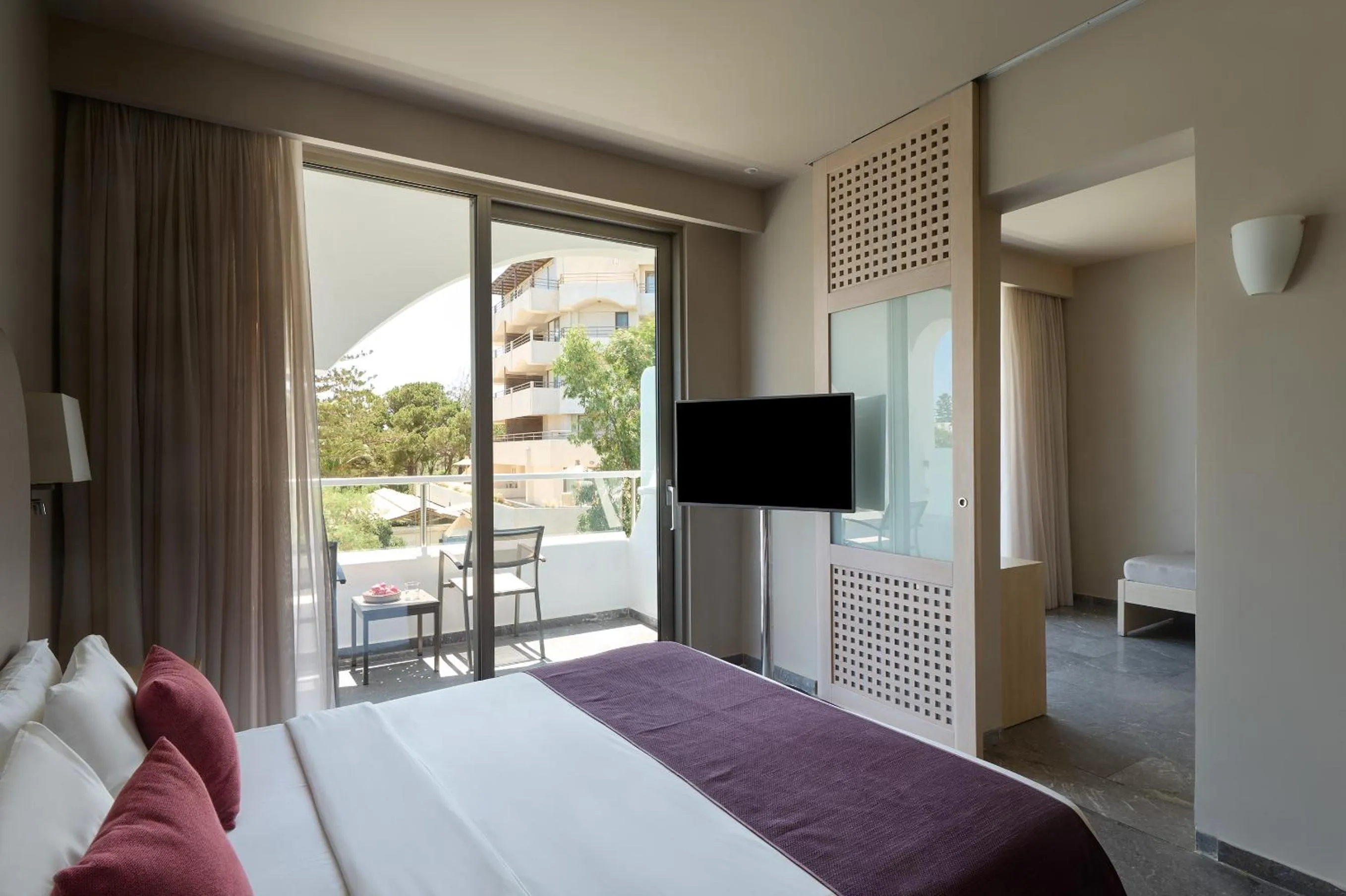 Bed in Atlantica Akti Zeus Hotel