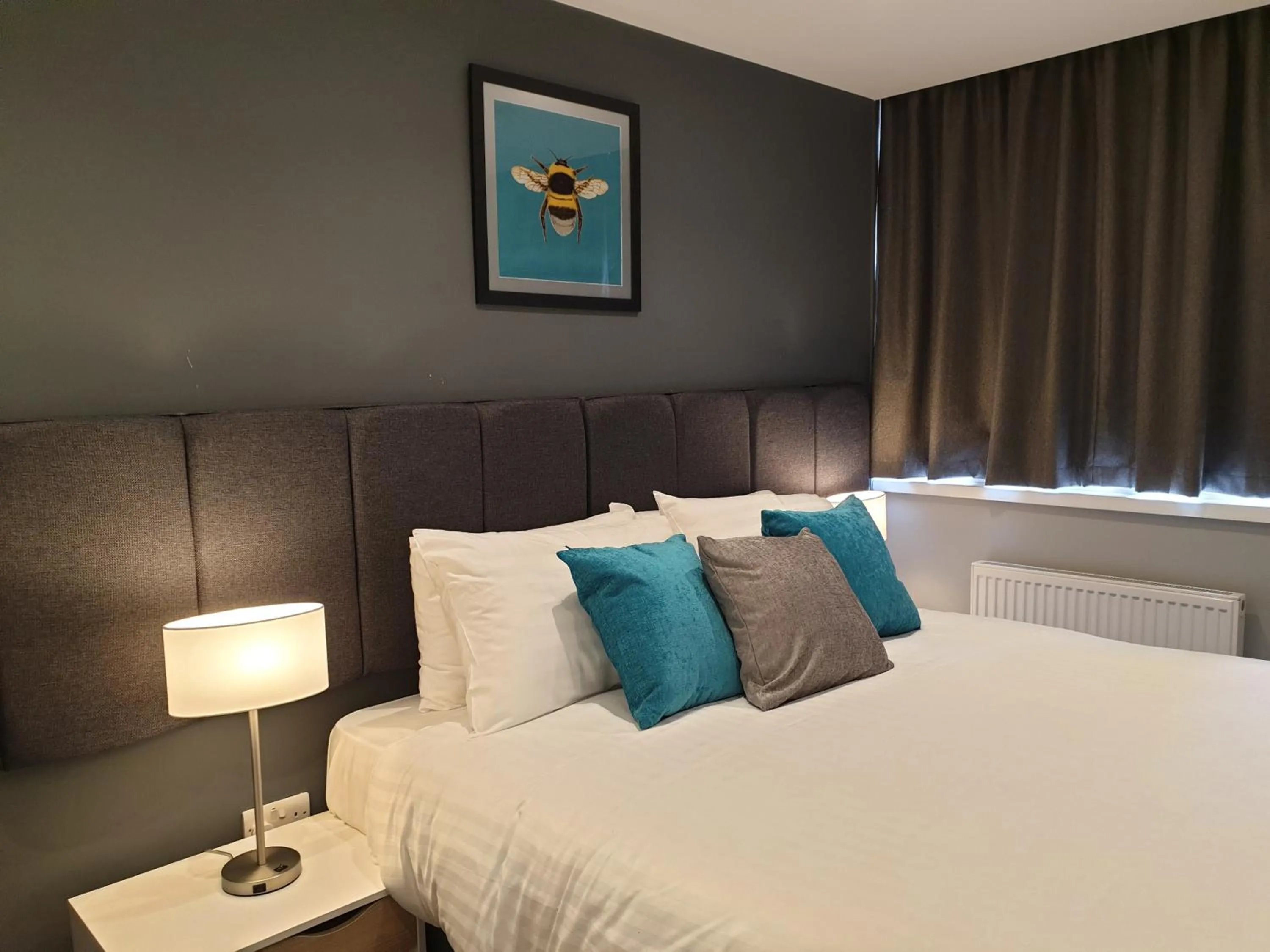 Bed in The Spires Serviced Apartments Cardiff