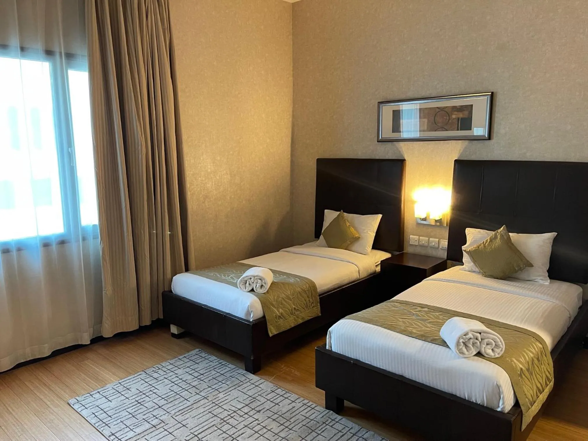 Bed in Tulip Creek Hotel Apartments