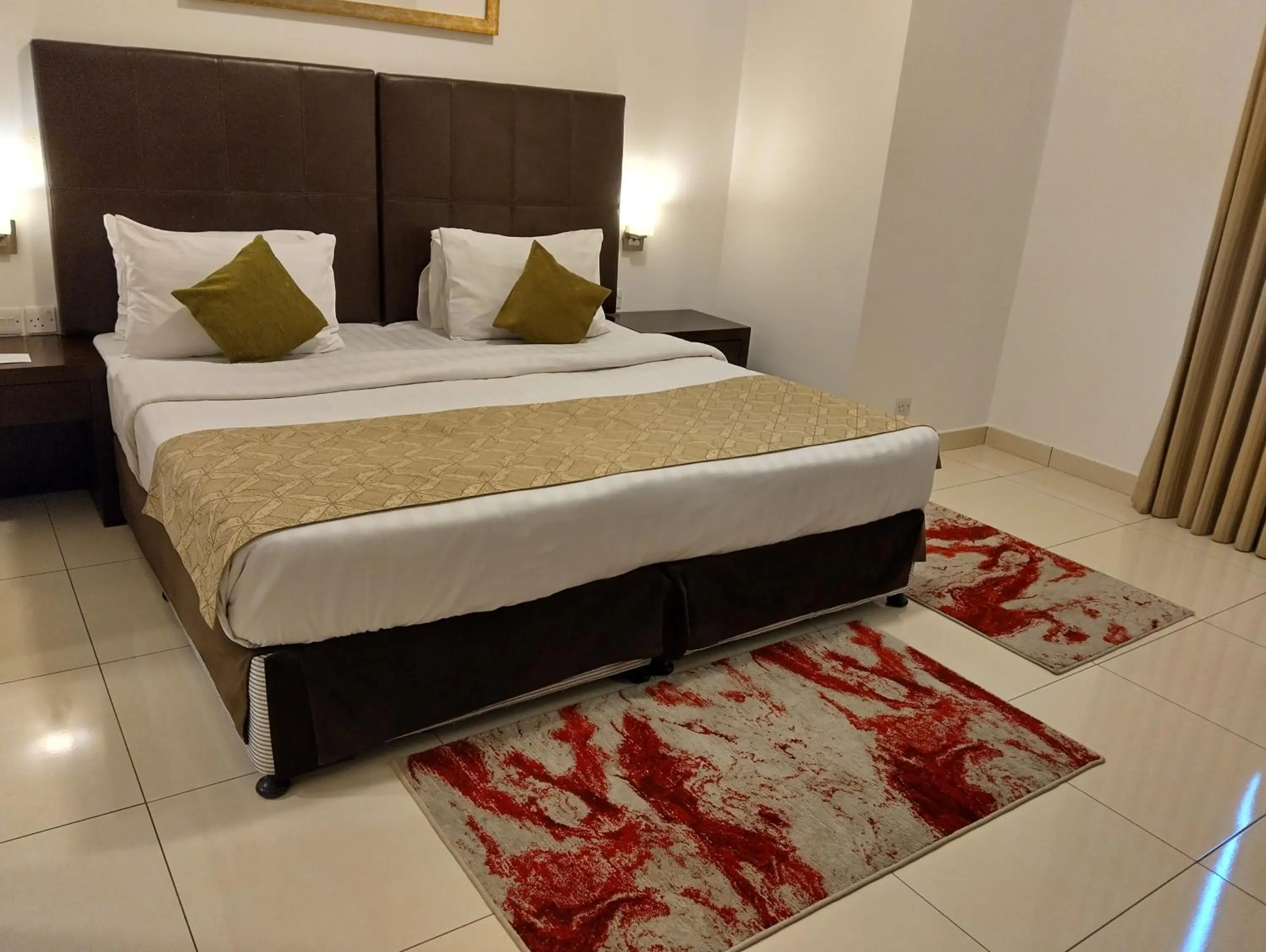 Bedroom, Bed in Tulip Creek Hotel Apartments