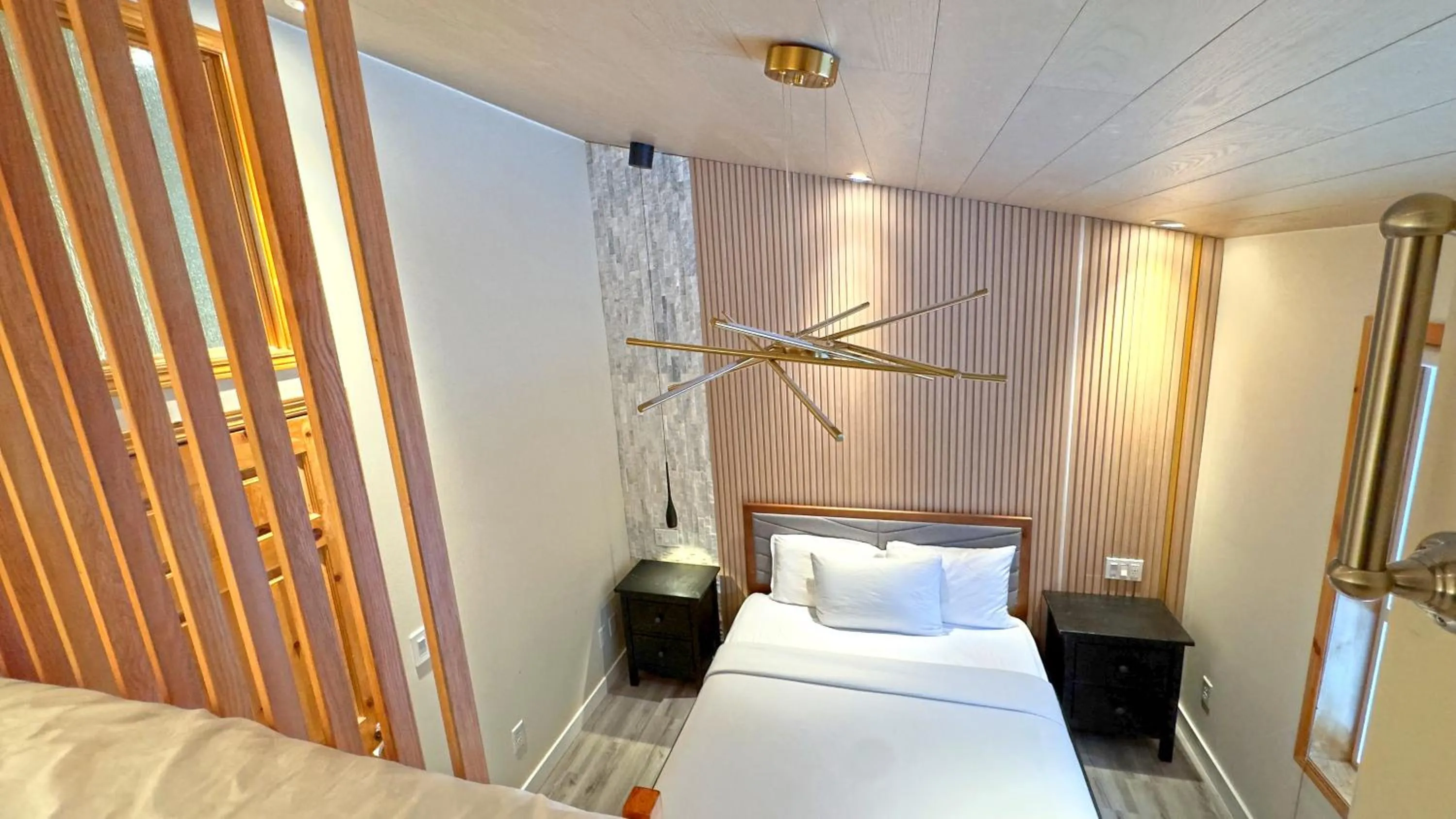 Bed in Banff Woods lodge