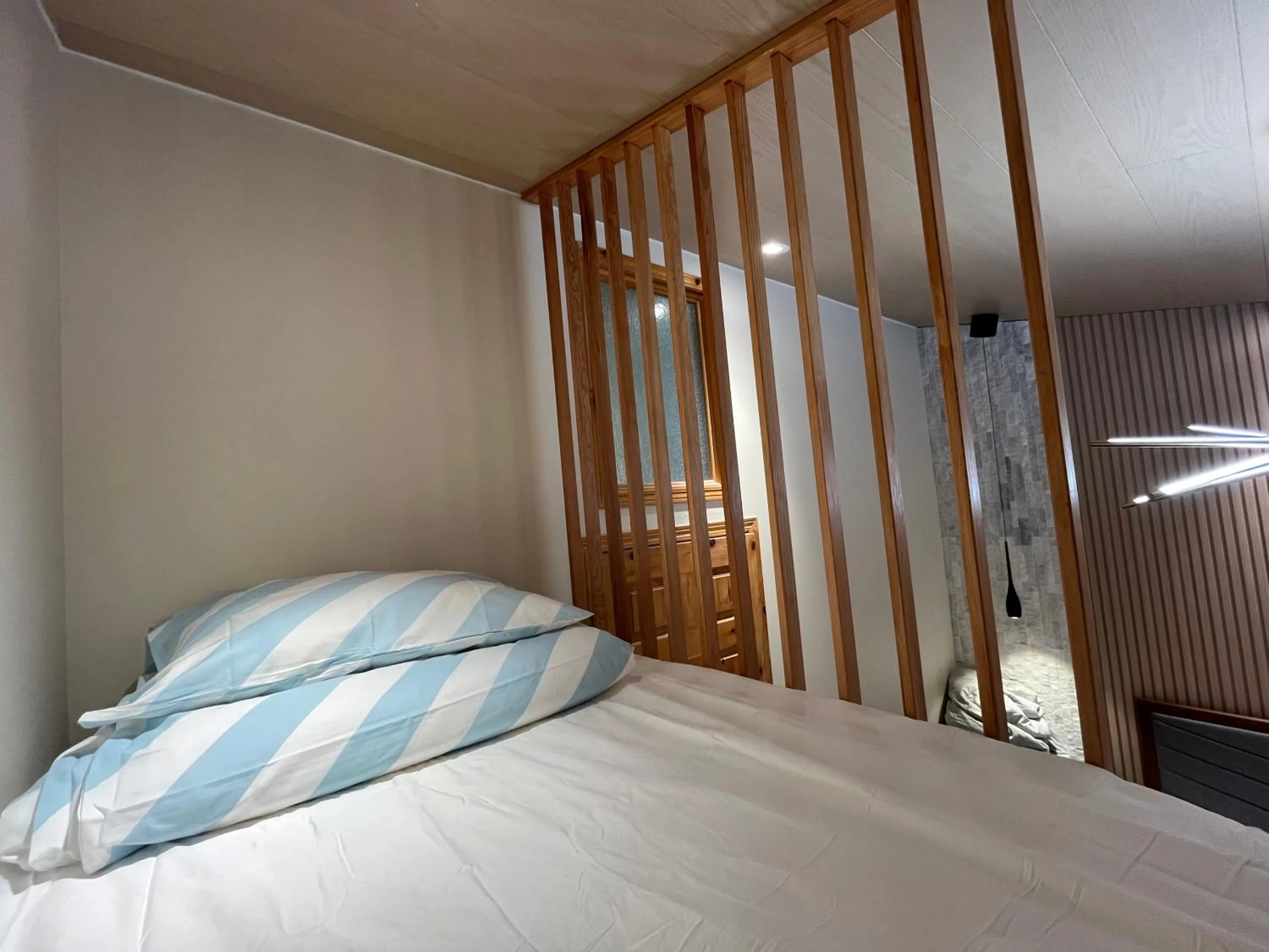 Bed in Banff Woods lodge