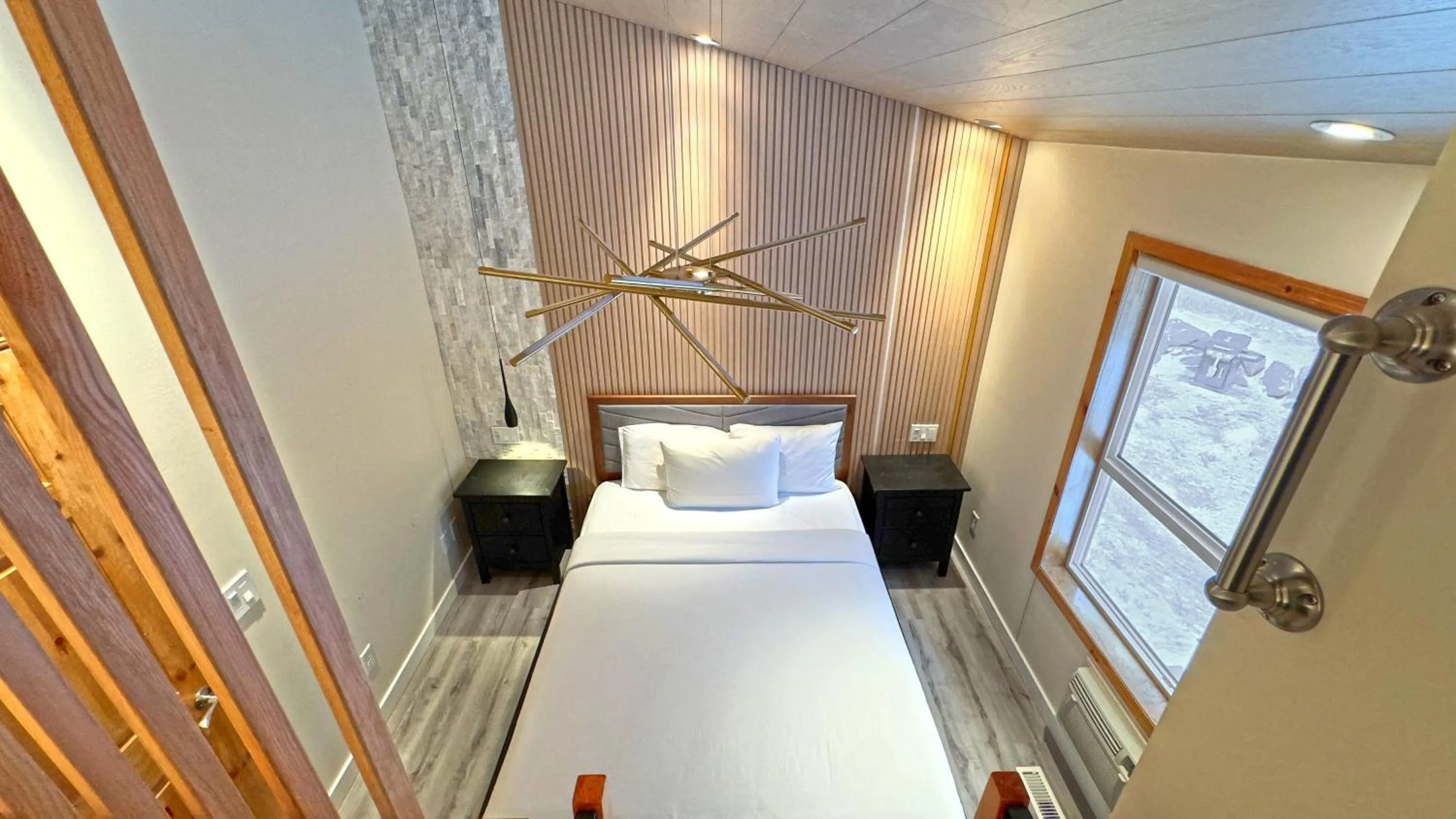 Bed in Banff Woods lodge