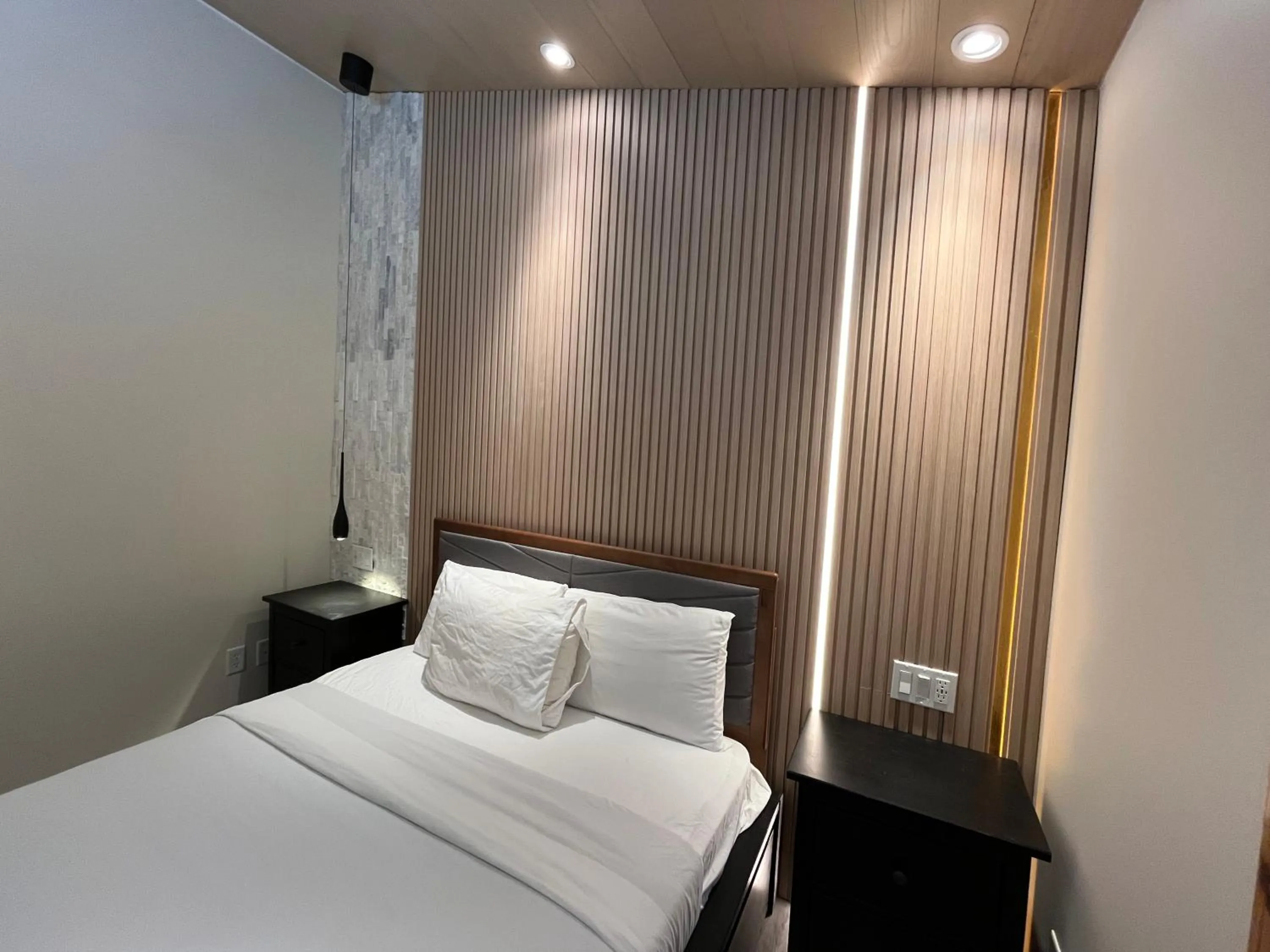 Bed in Banff Woods lodge