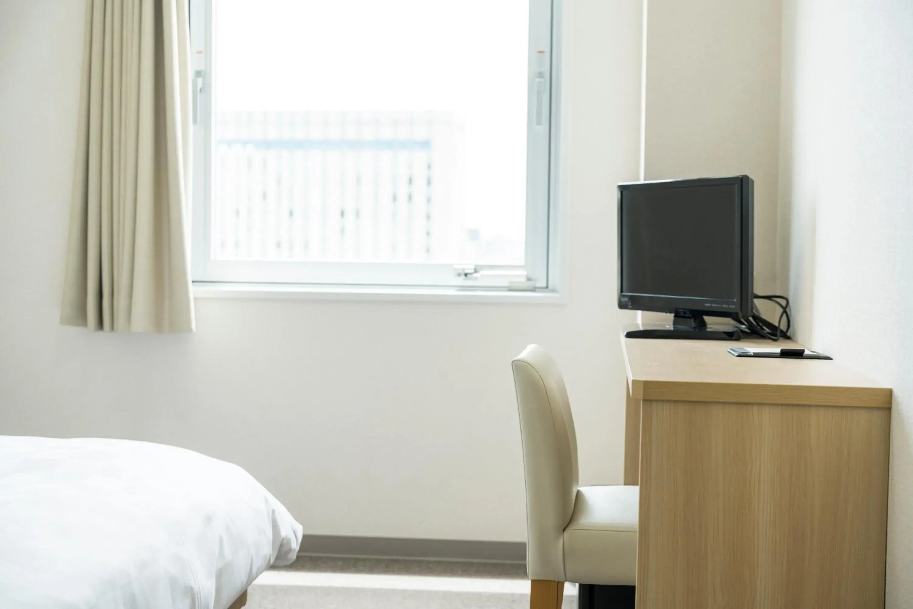 Photo of the whole room, Bed in KOKO HOTEL Kagoshima Tenmonkan Photo of the whole room, Bed in KOKO HOTEL Kagoshima Tenmonkan