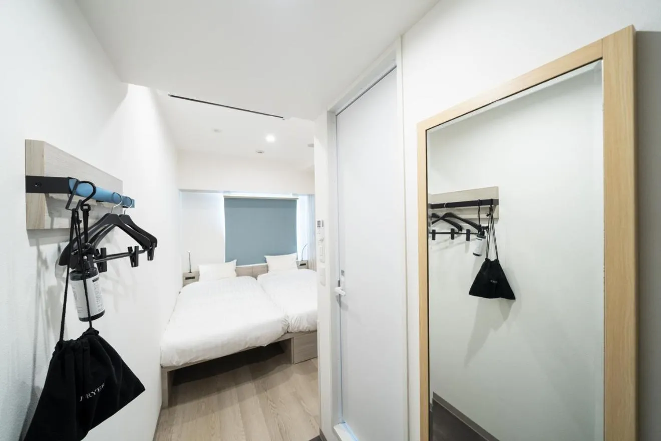 Bed in KOKO HOTEL Kagoshima Tenmonkan