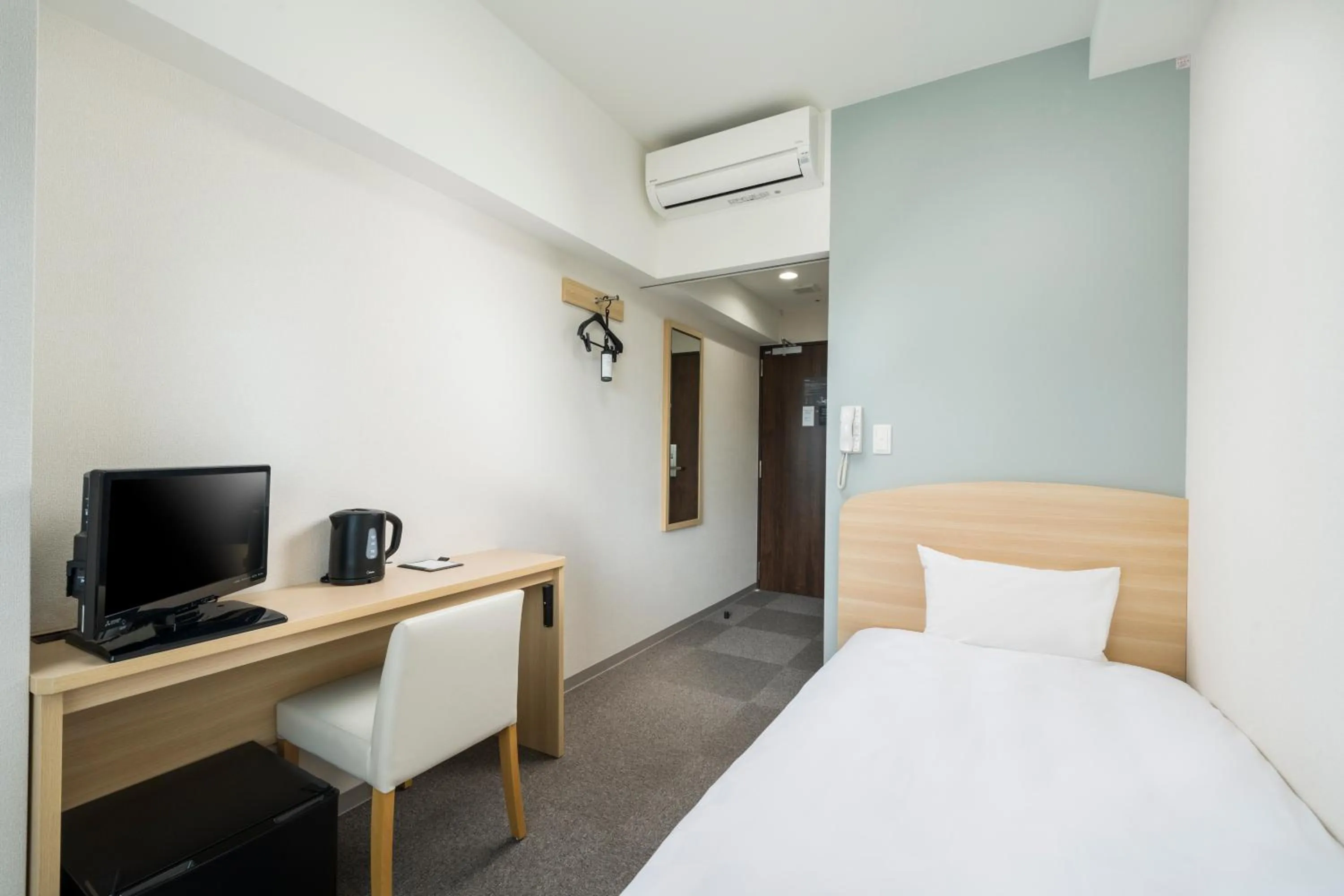 Photo of the whole room, Bed in KOKO HOTEL Kagoshima Tenmonkan