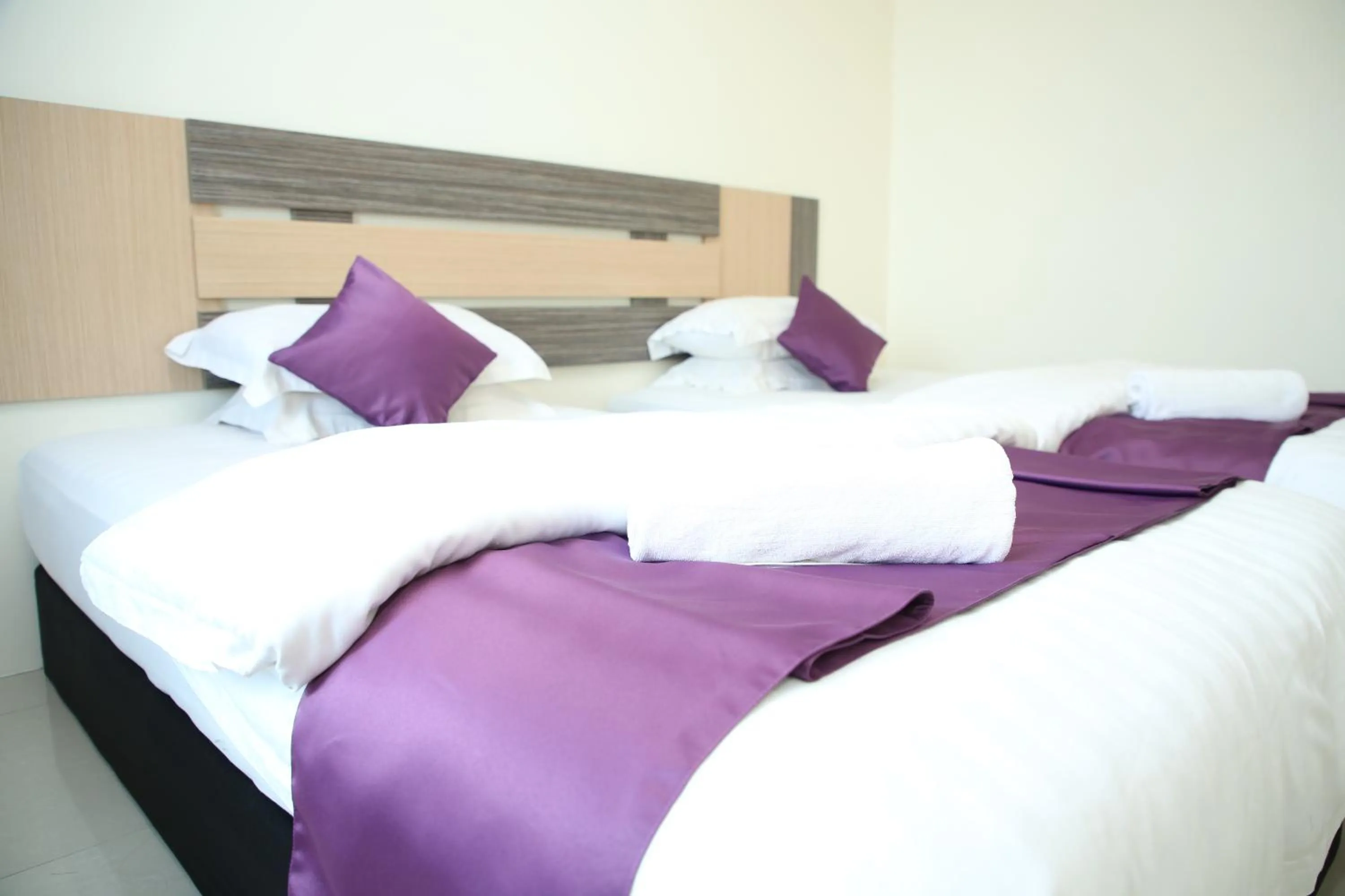 Bed in MY Fame Hotel