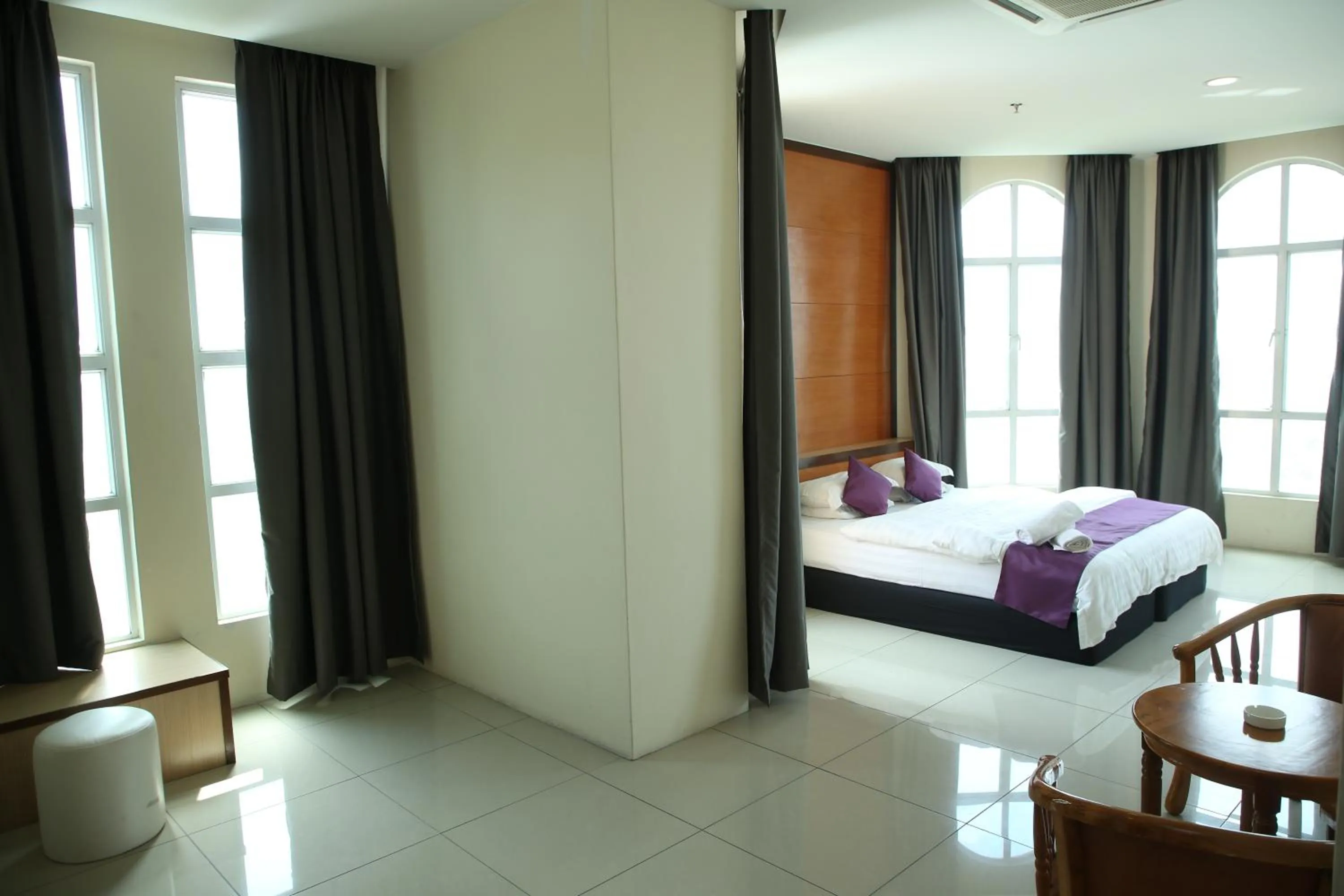 Bed in MY Fame Hotel