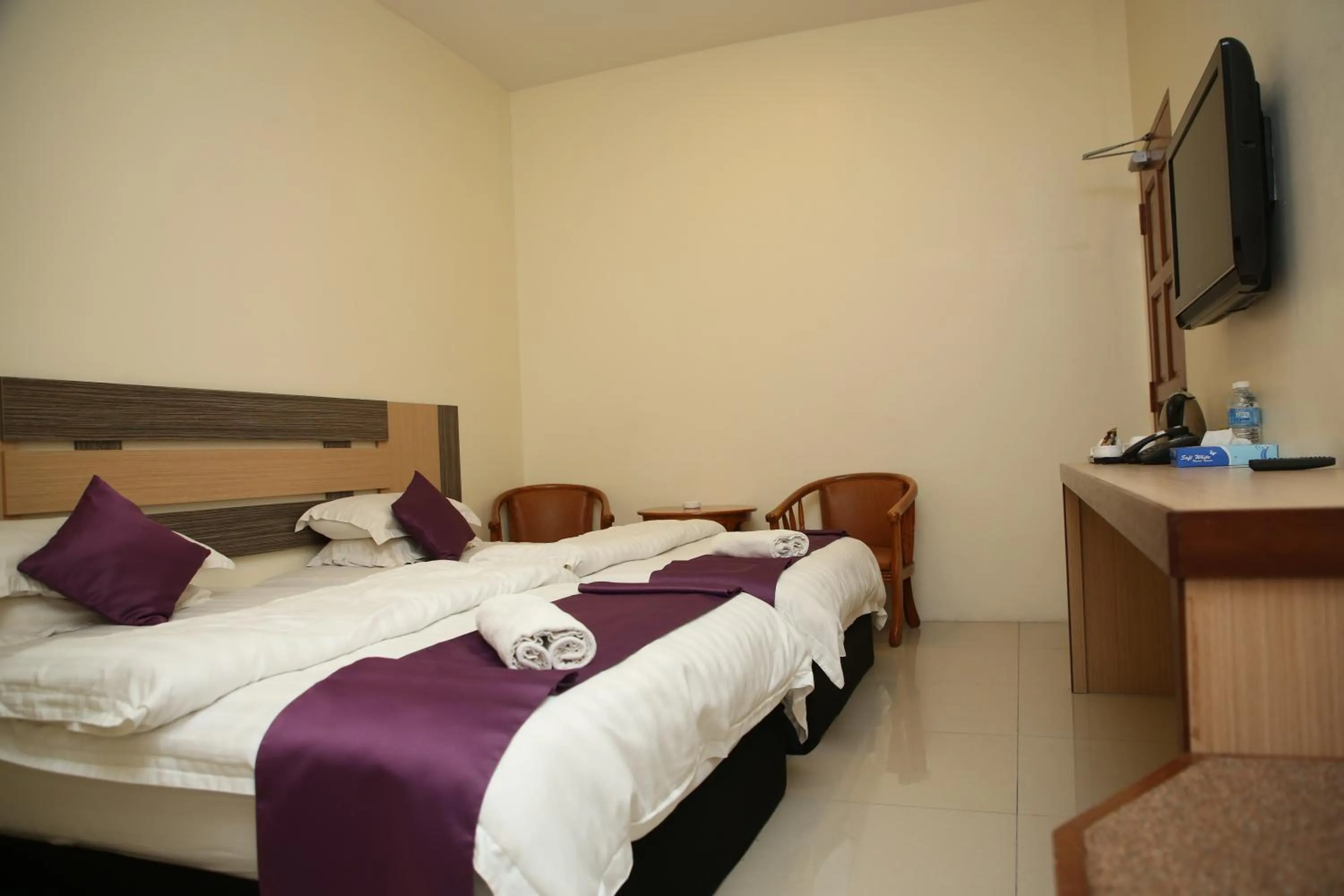 Bed in MY Fame Hotel