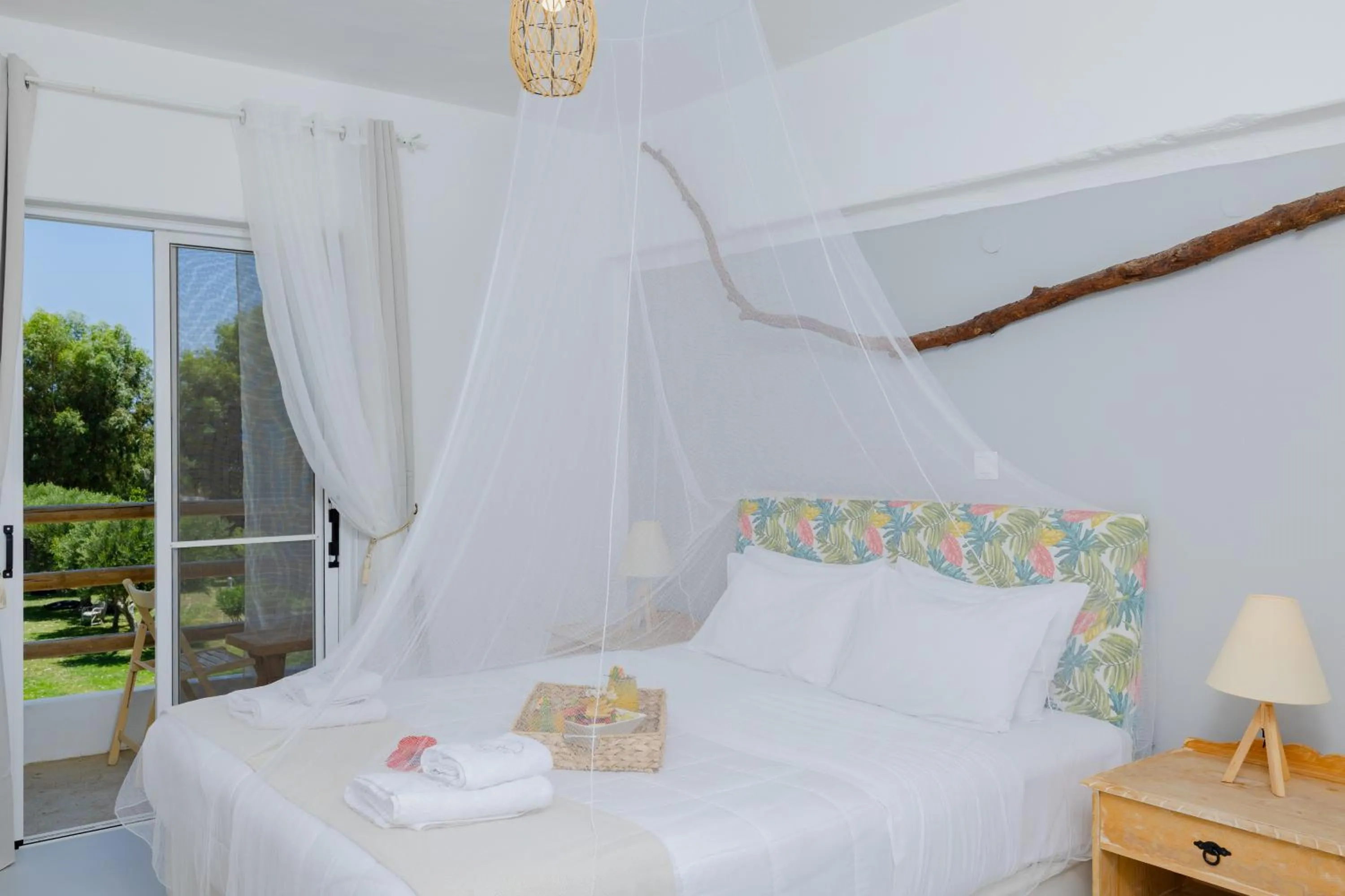Bed in Eco Beach And Magic Garden Hotel