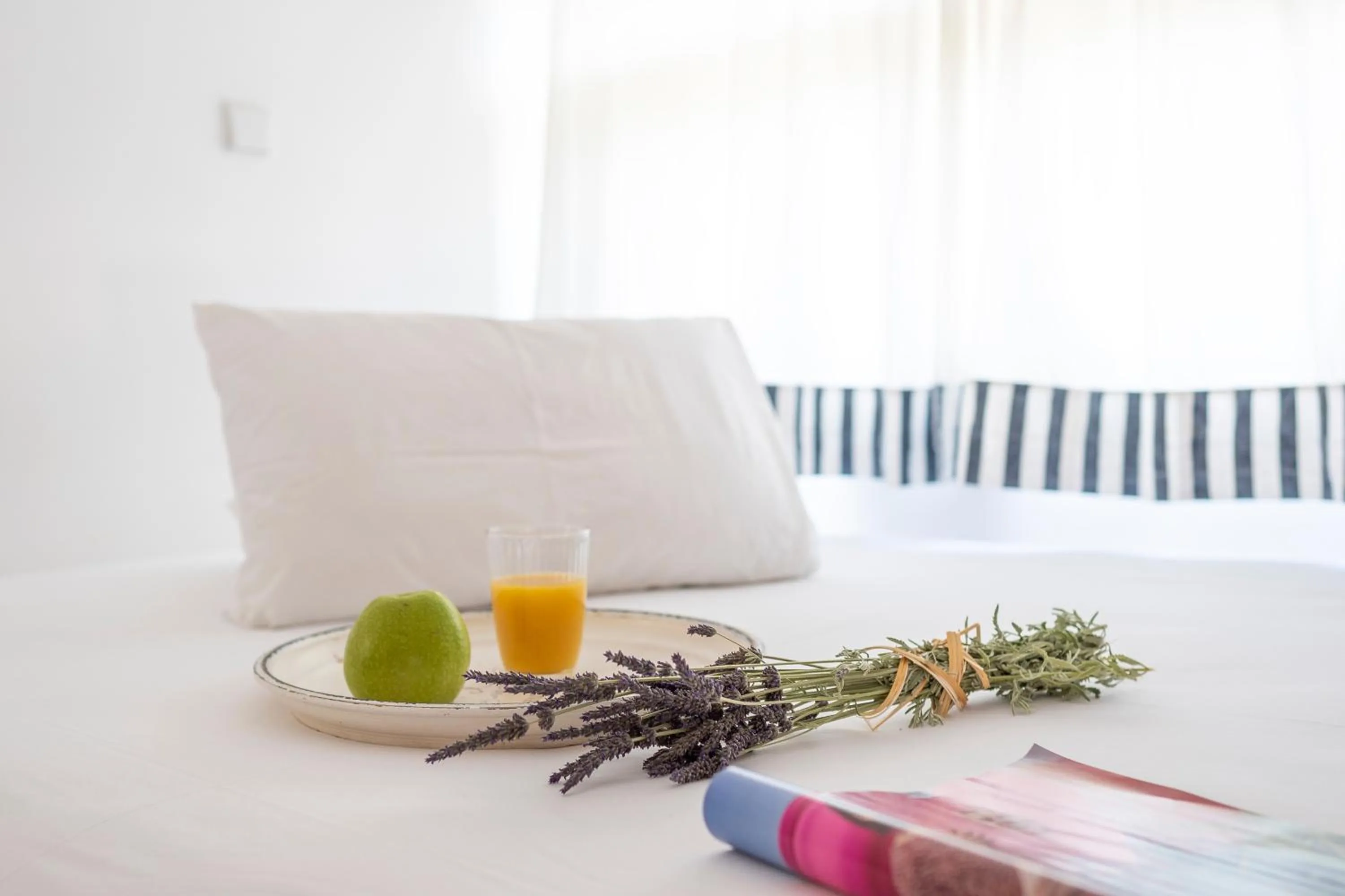 Bed in Eco Beach And Magic Garden Hotel