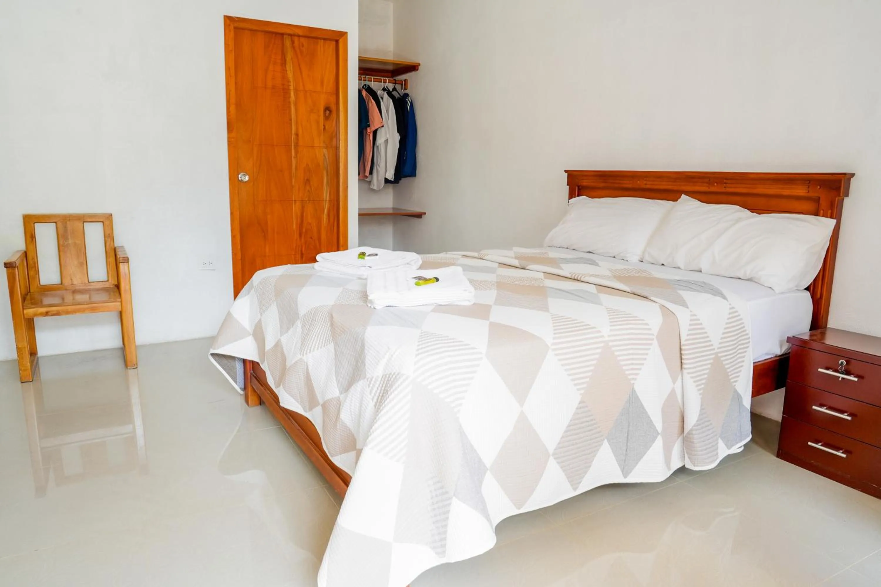 Bed in Royal Galápagos Inn