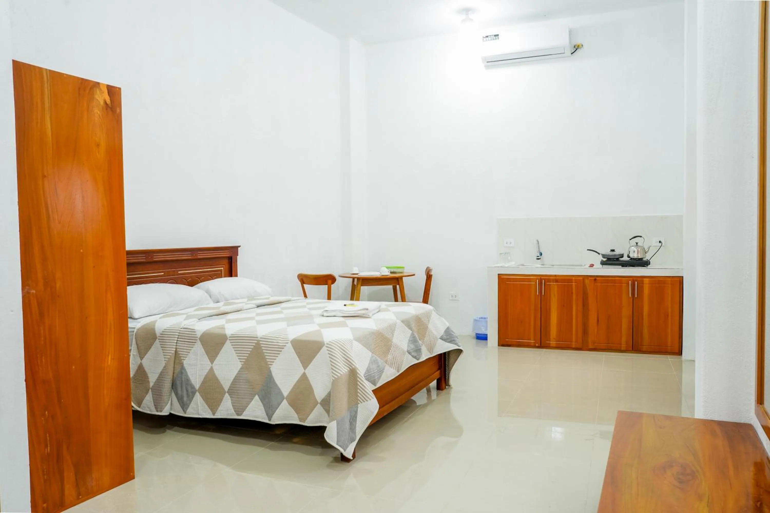 Bed in Royal Galápagos Inn