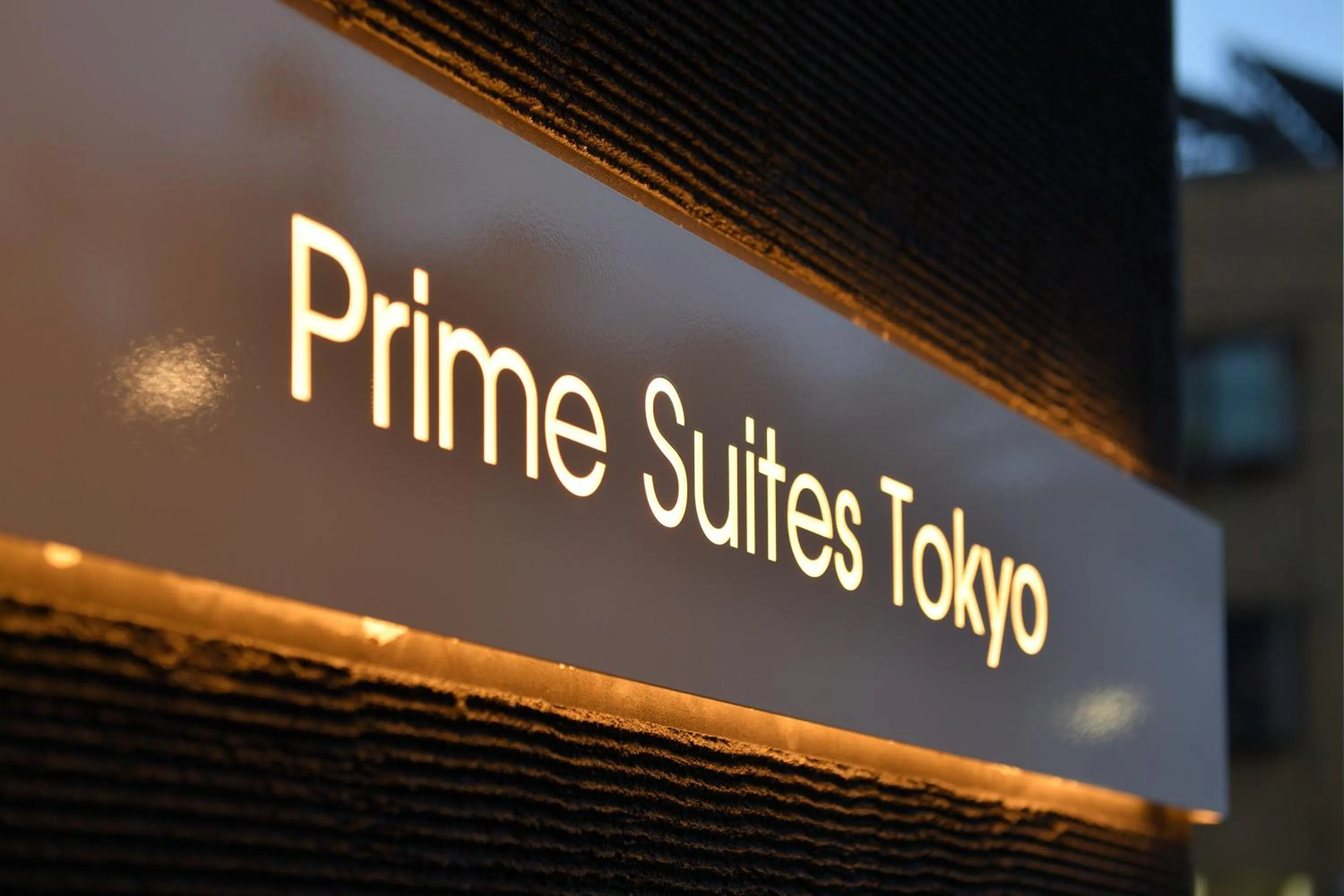 Property logo or sign in Prime Suites Tokyo