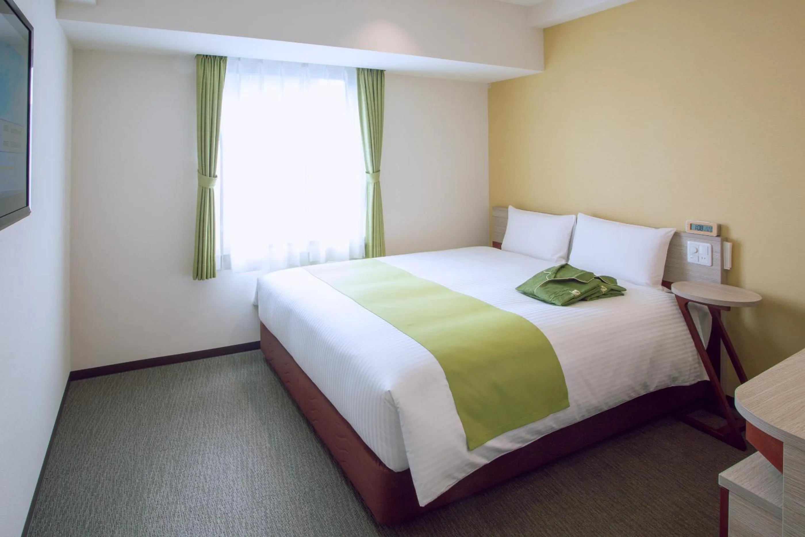 Bed in Kuretake Inn Premium Meieki minami