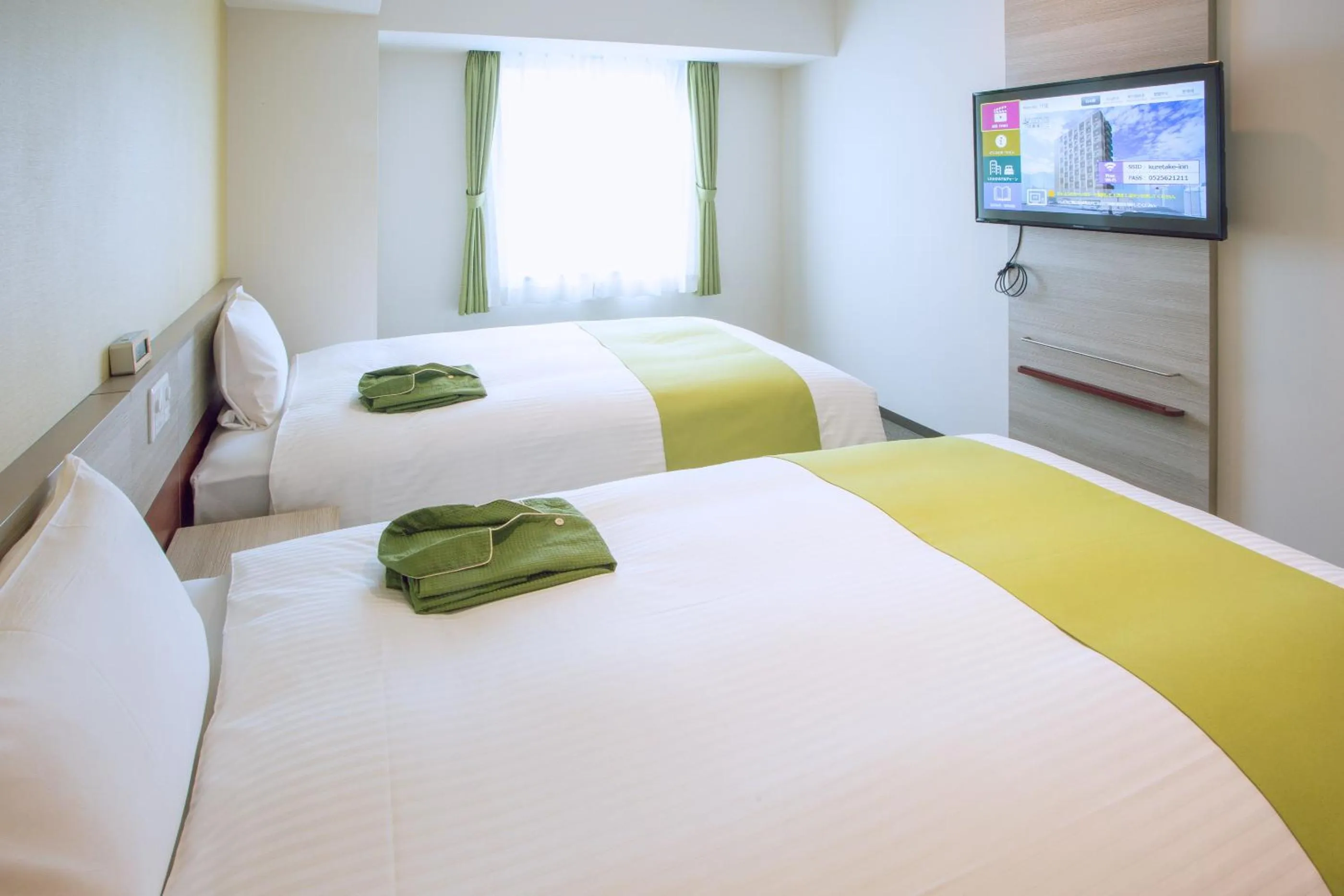 Bed in Kuretake Inn Premium Meieki minami