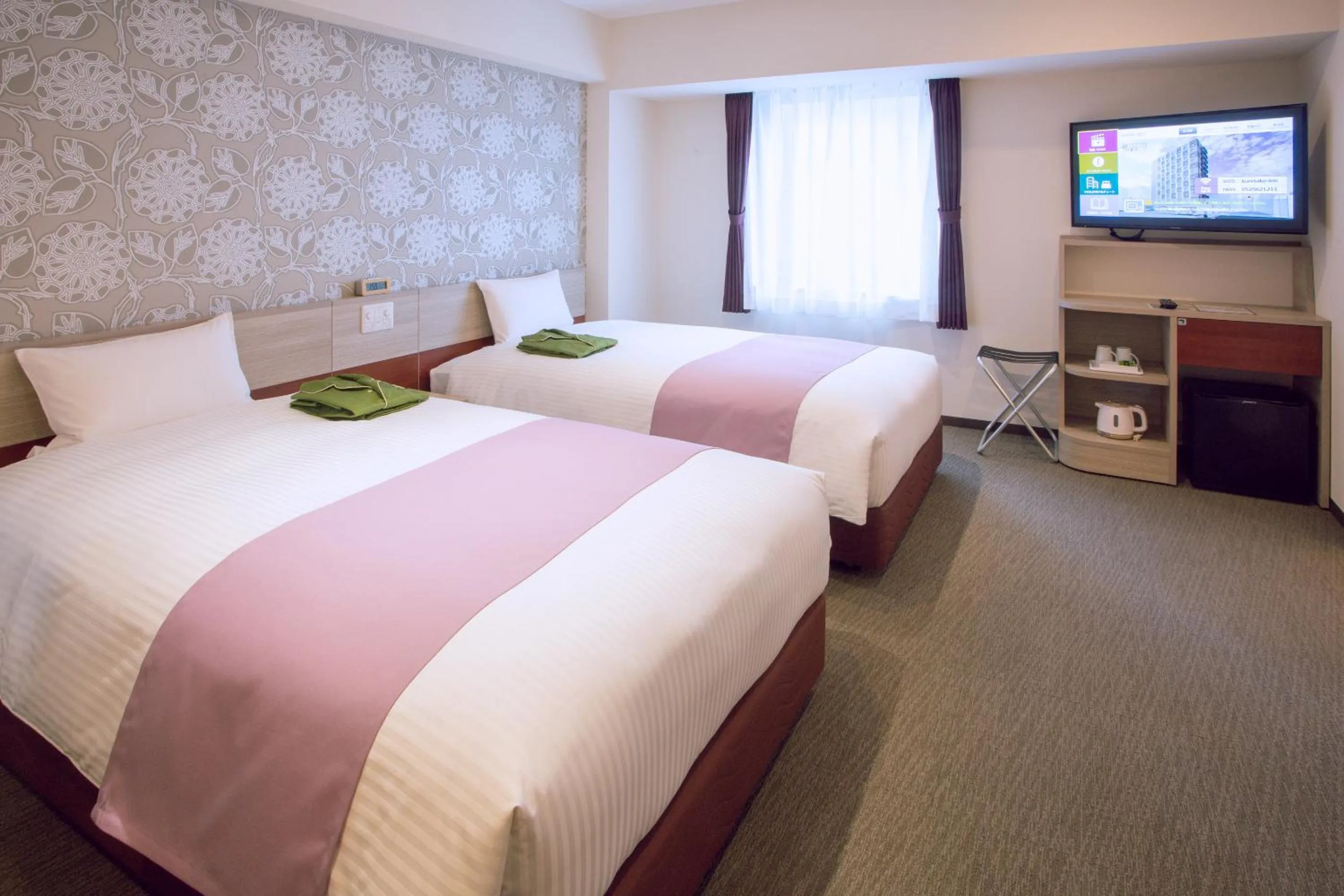 Bed in Kuretake Inn Premium Meieki minami