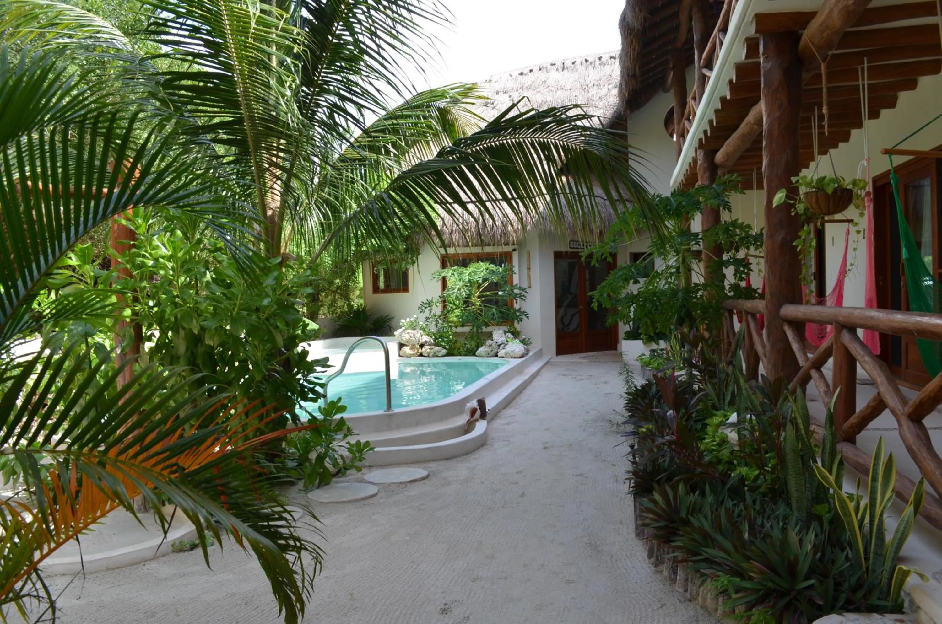 Swimming pool in Casa Iguana Holbox - Beachfront Hotel