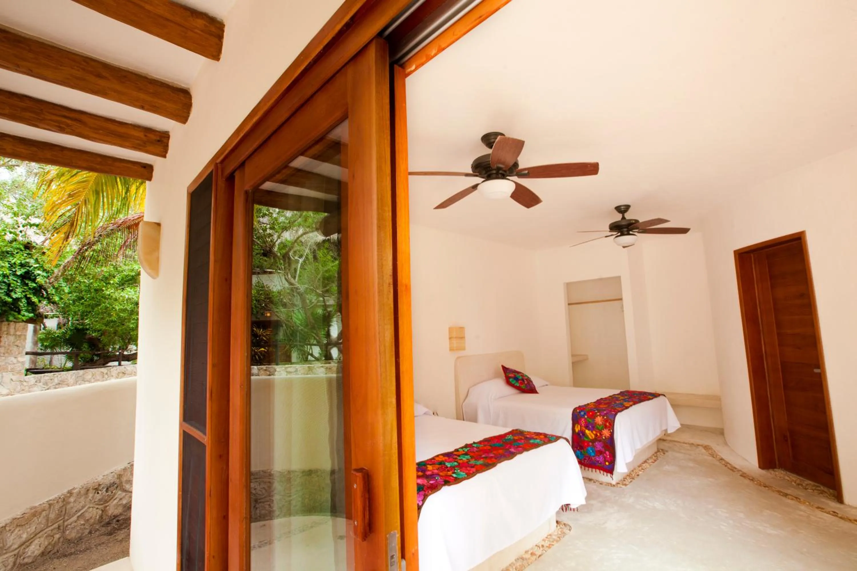 Photo of the whole room in Casa Iguana Holbox - Beachfront Hotel