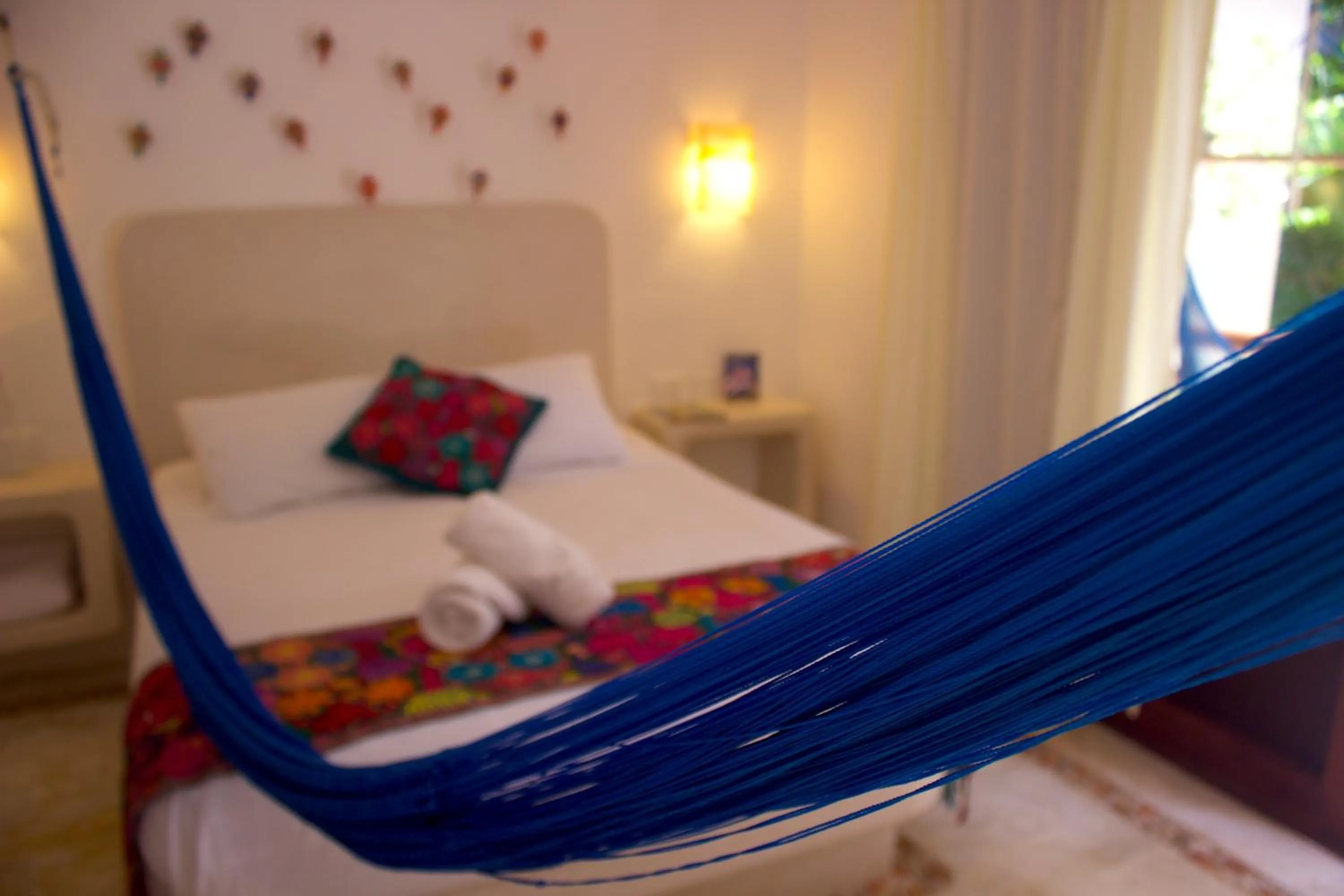 Bedroom, Bed in Casa Iguana Holbox - Beachfront Hotel