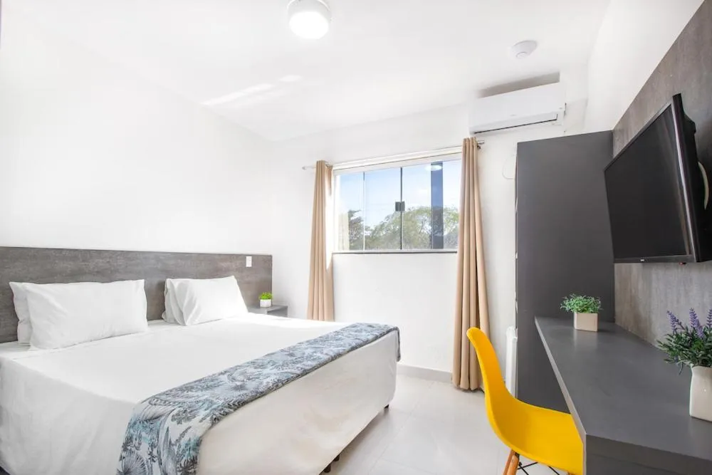 Photo of the whole room, Bed in Hotel Cajueiro Guarujá