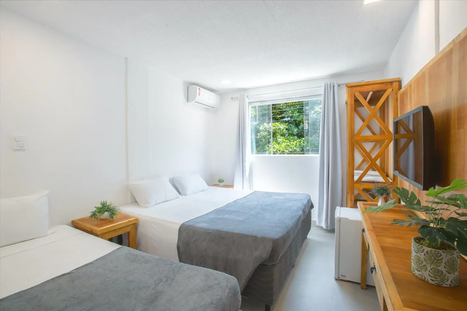 Bed in Hotel Cajueiro Guarujá