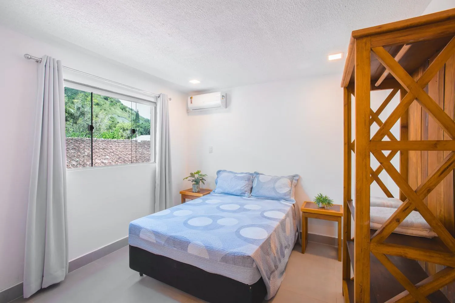 Bed in Hotel Cajueiro Guarujá