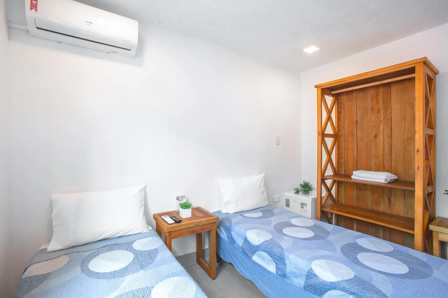 Bed in Hotel Cajueiro Guarujá