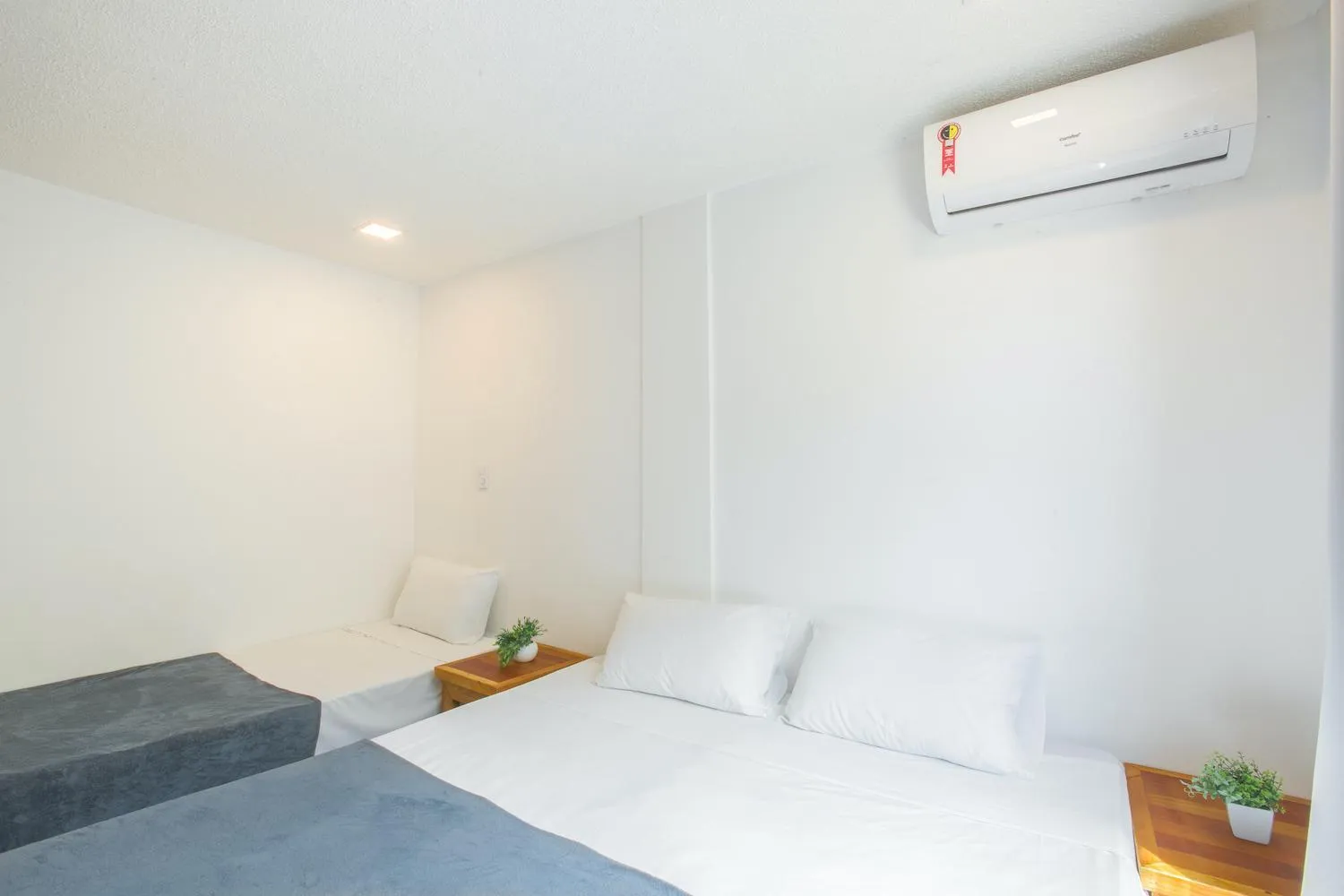 Bed in Hotel Cajueiro Guarujá