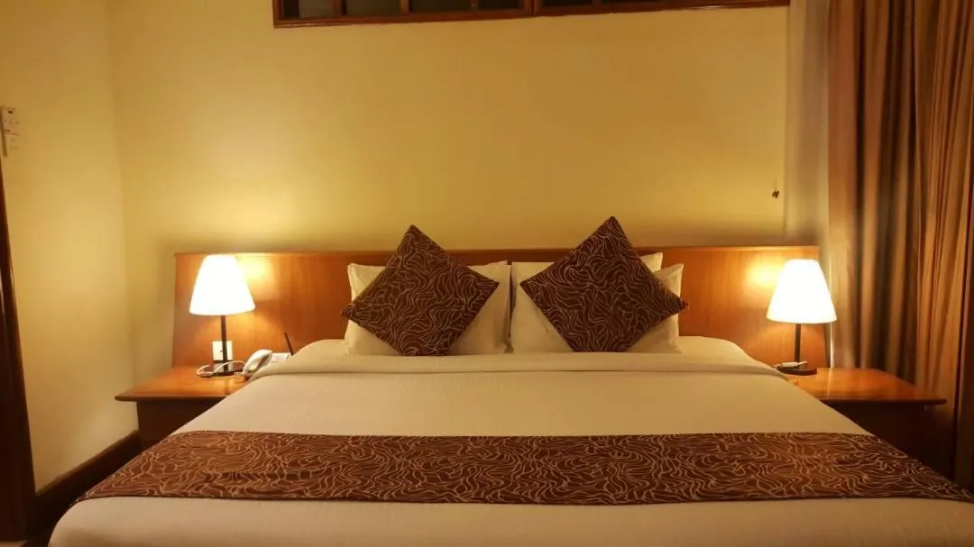 Bed in THE LAGOON WATER CHALET