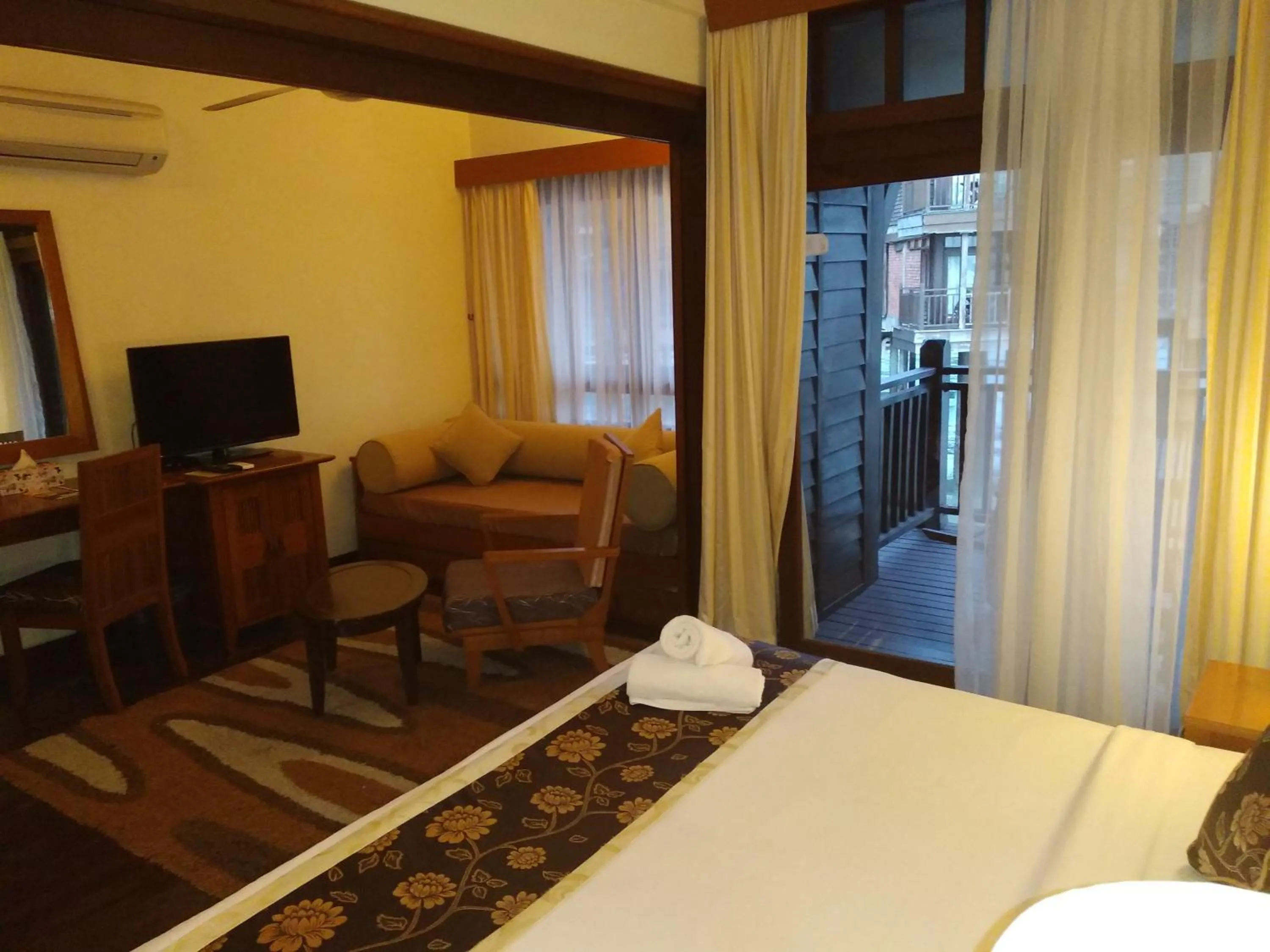 Bed in THE LAGOON WATER CHALET