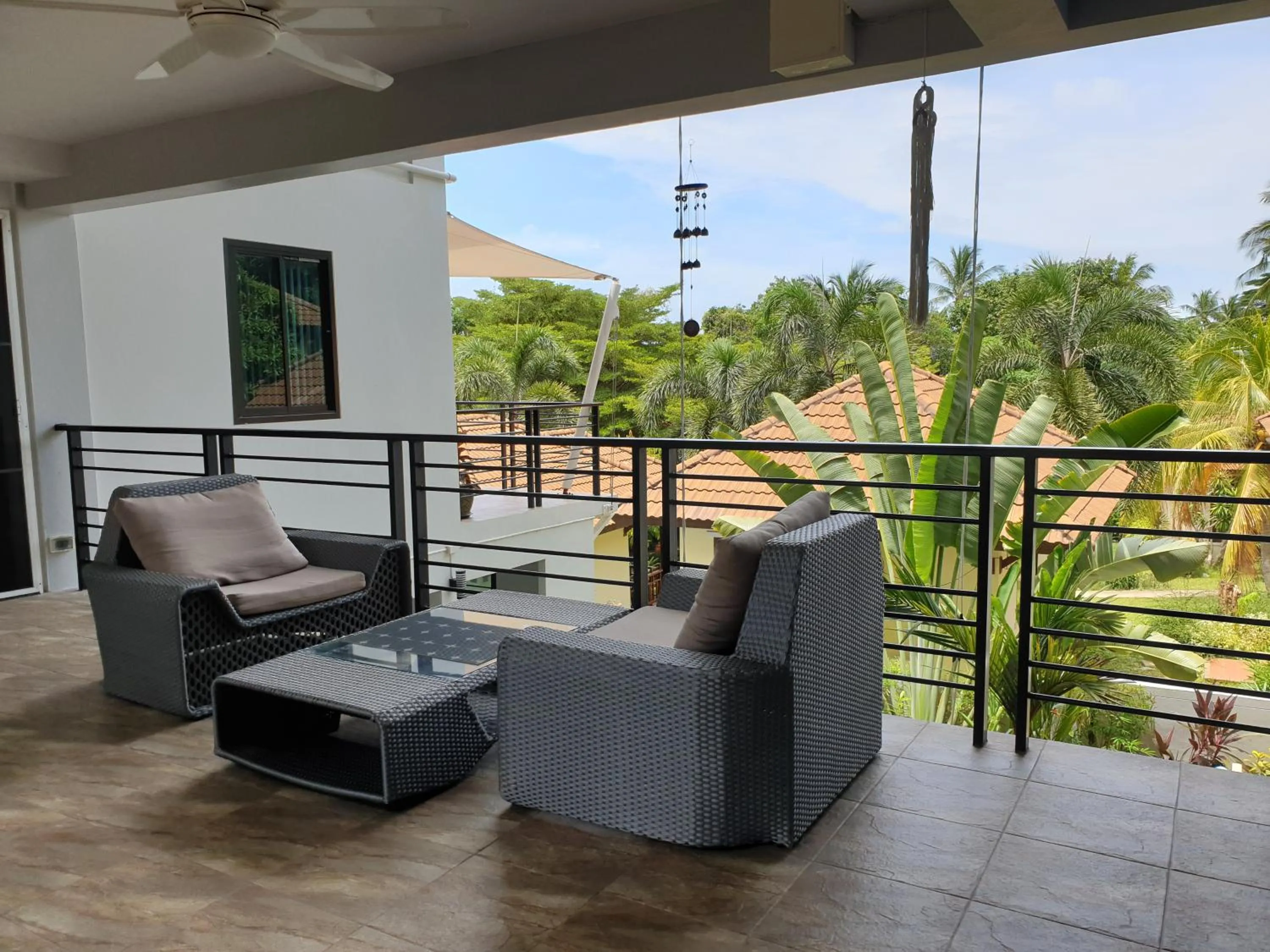 Seating area in Penthouse Crystal Bay Apartments