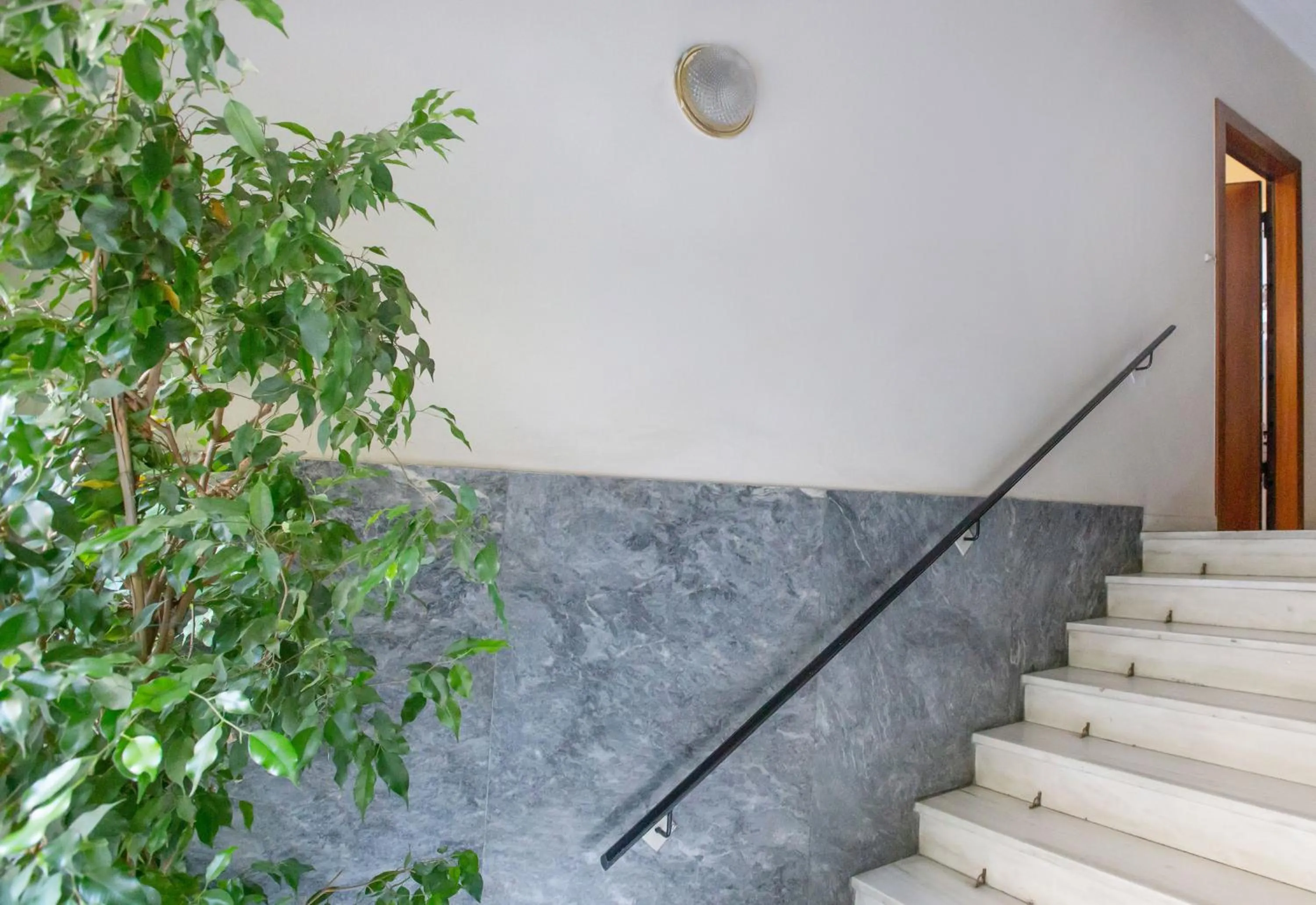 Facade/entrance in Isora Apartment by GHH