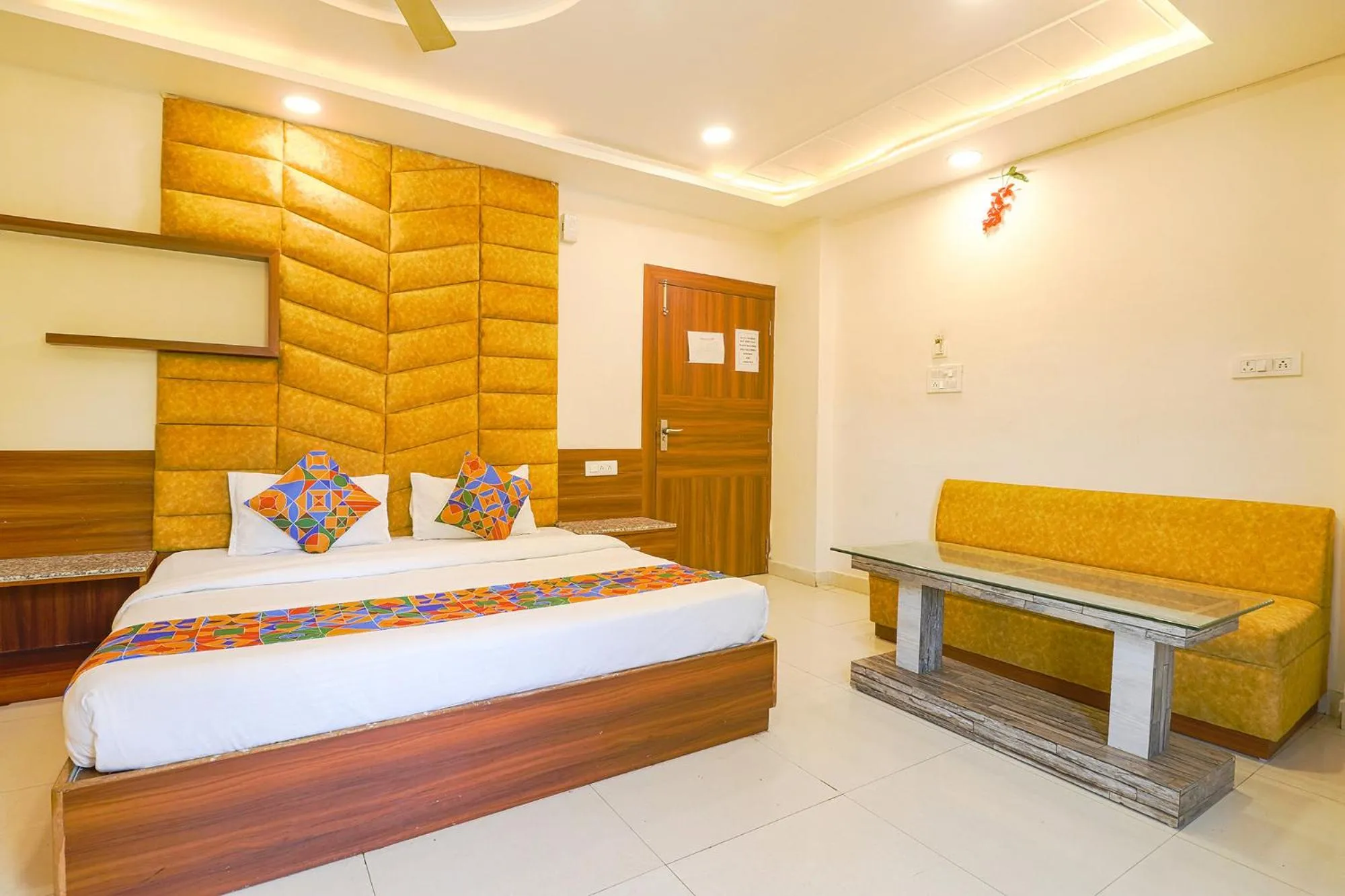 Bed in FabHotel Royal Aanandam