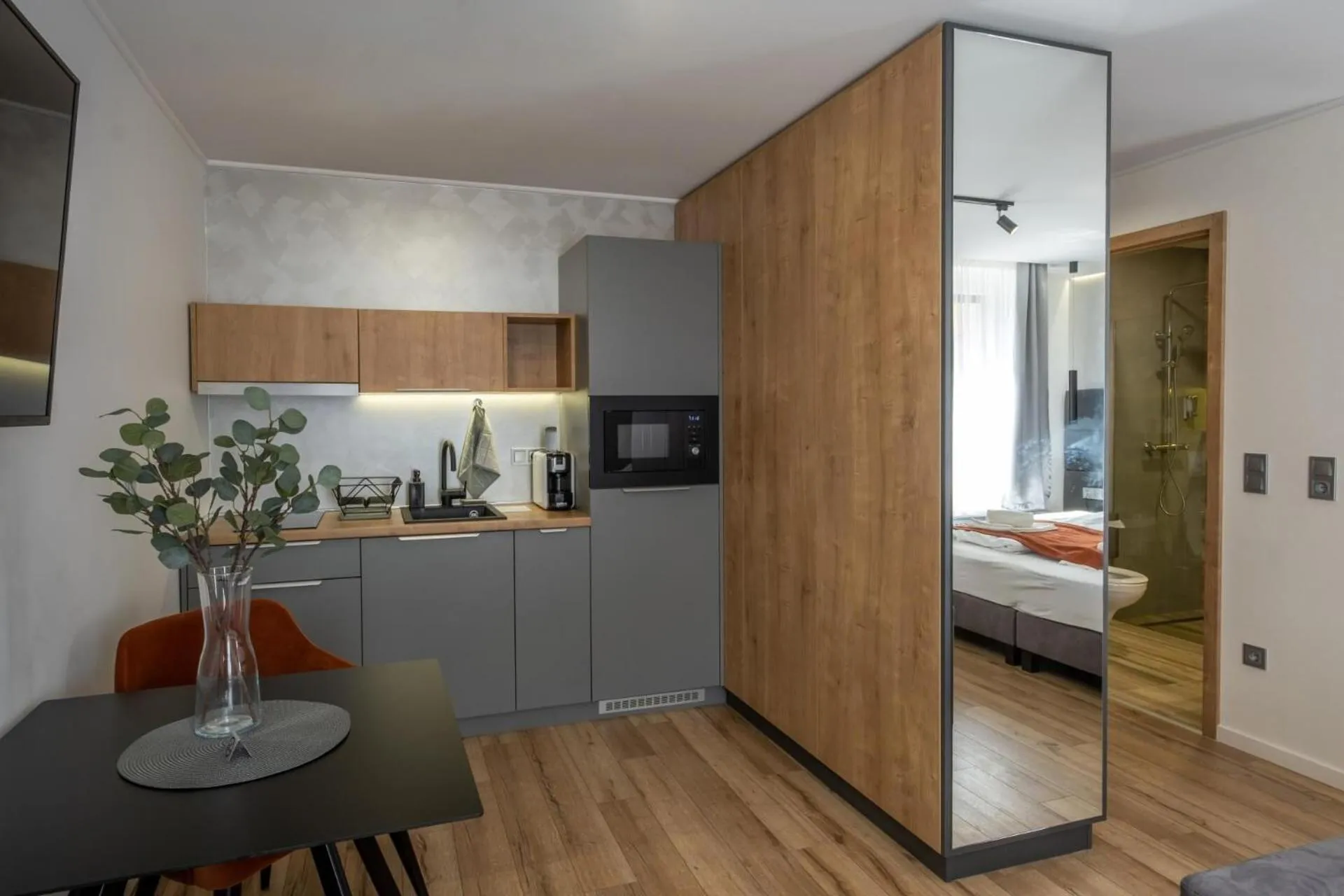 Kitchen or kitchenette, Bed in Minaret Residence & Relax Pécs