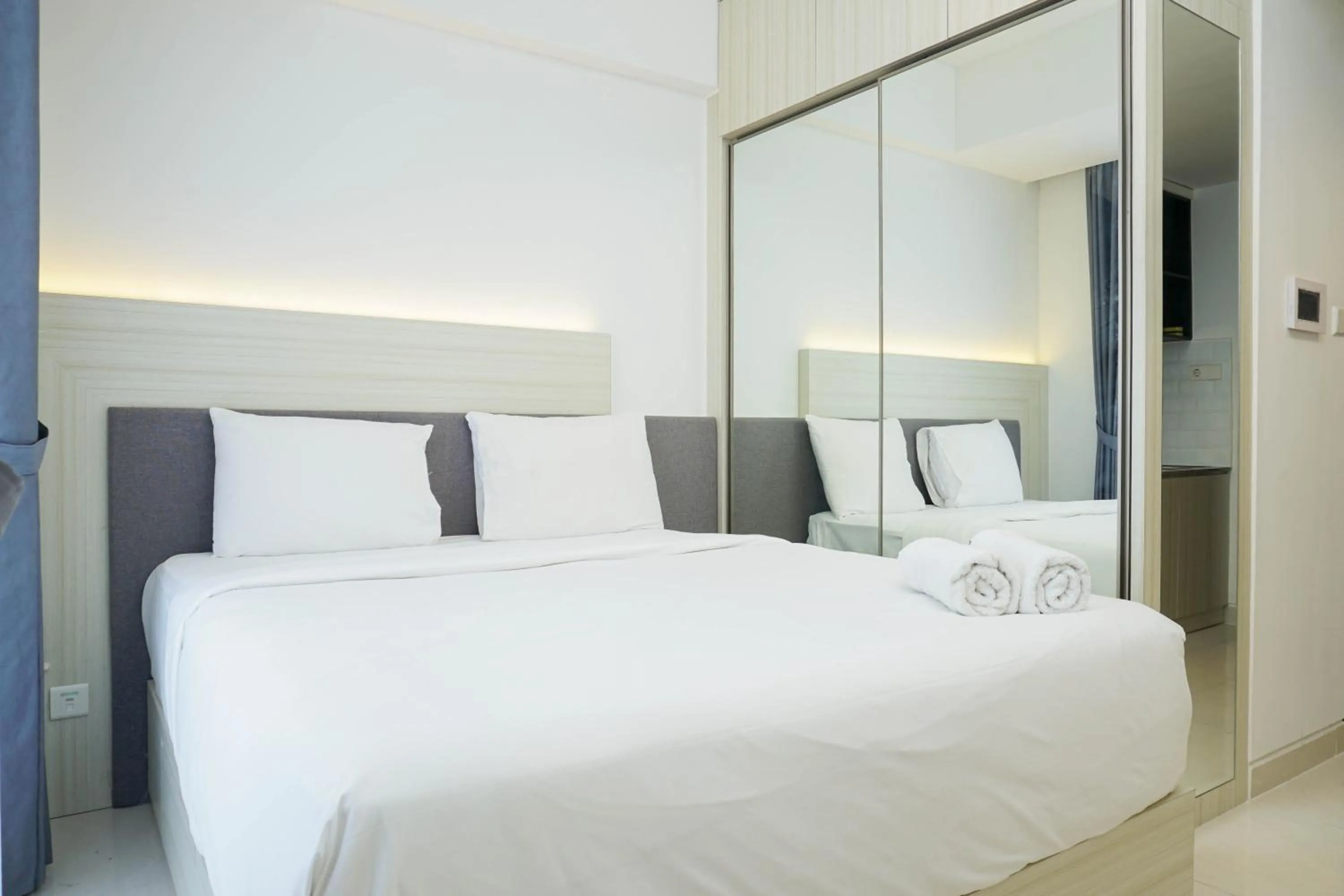 Bedroom, Bed in Relax and Comfy with Pool View at Studio West Vista Apartment By Travelio