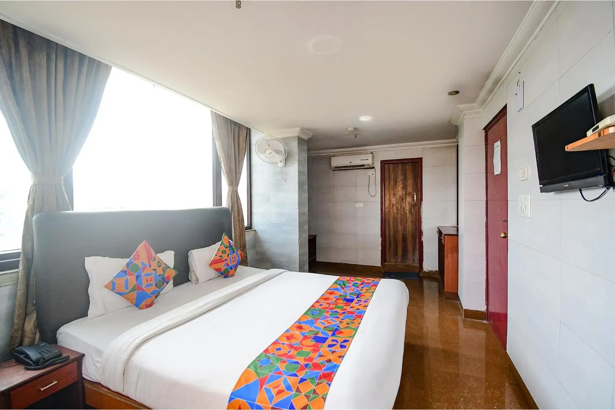 Communal lounge/ TV room, Bed in FabHotel Raj Darbar Communal lounge/ TV room, Bed in FabHotel Raj Darbar