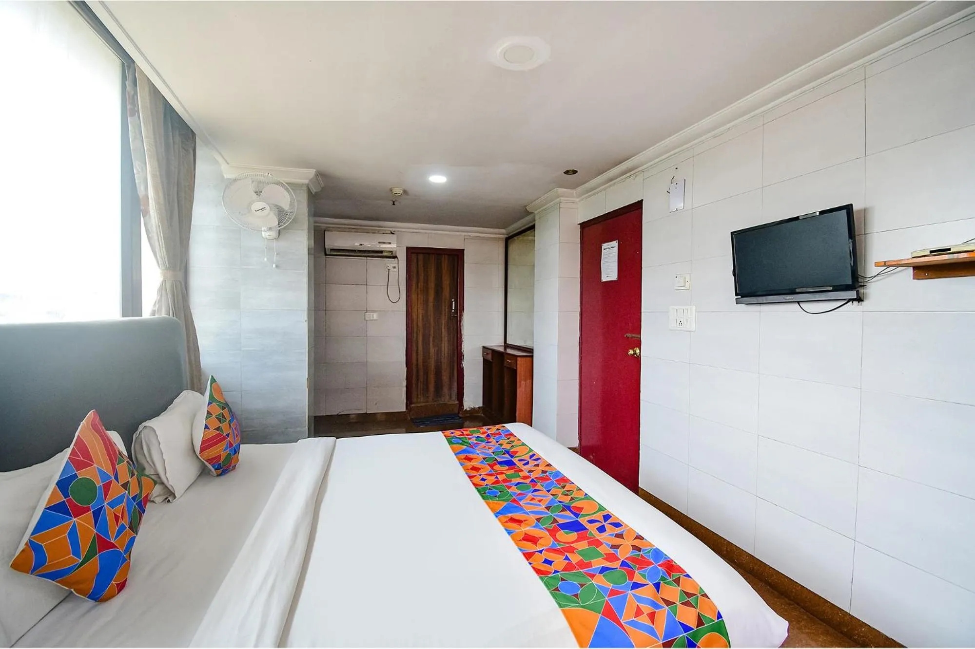 Communal lounge/ TV room, Bed in FabHotel Raj Darbar