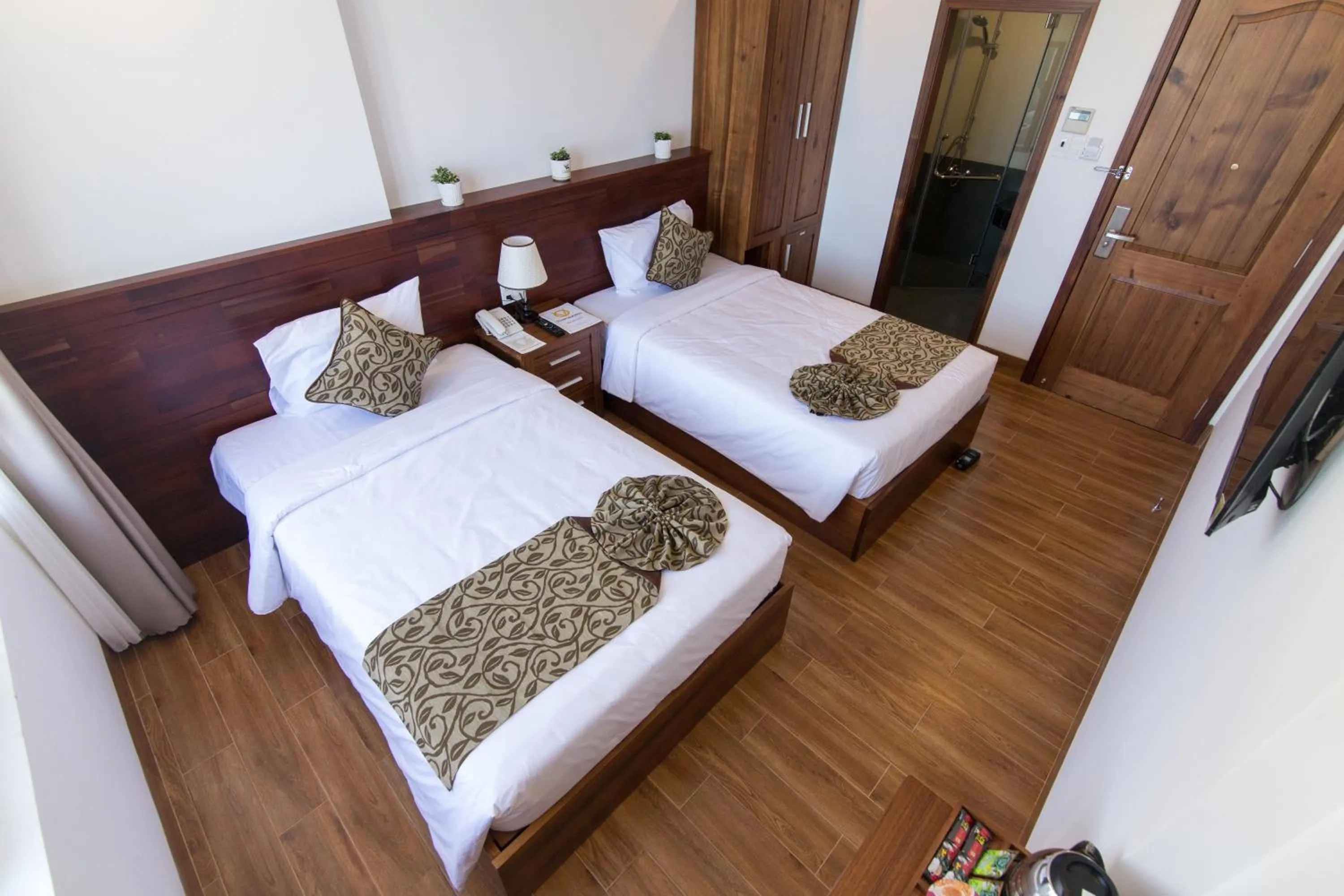 Bed in Ocean View Quy Nhon Hotel