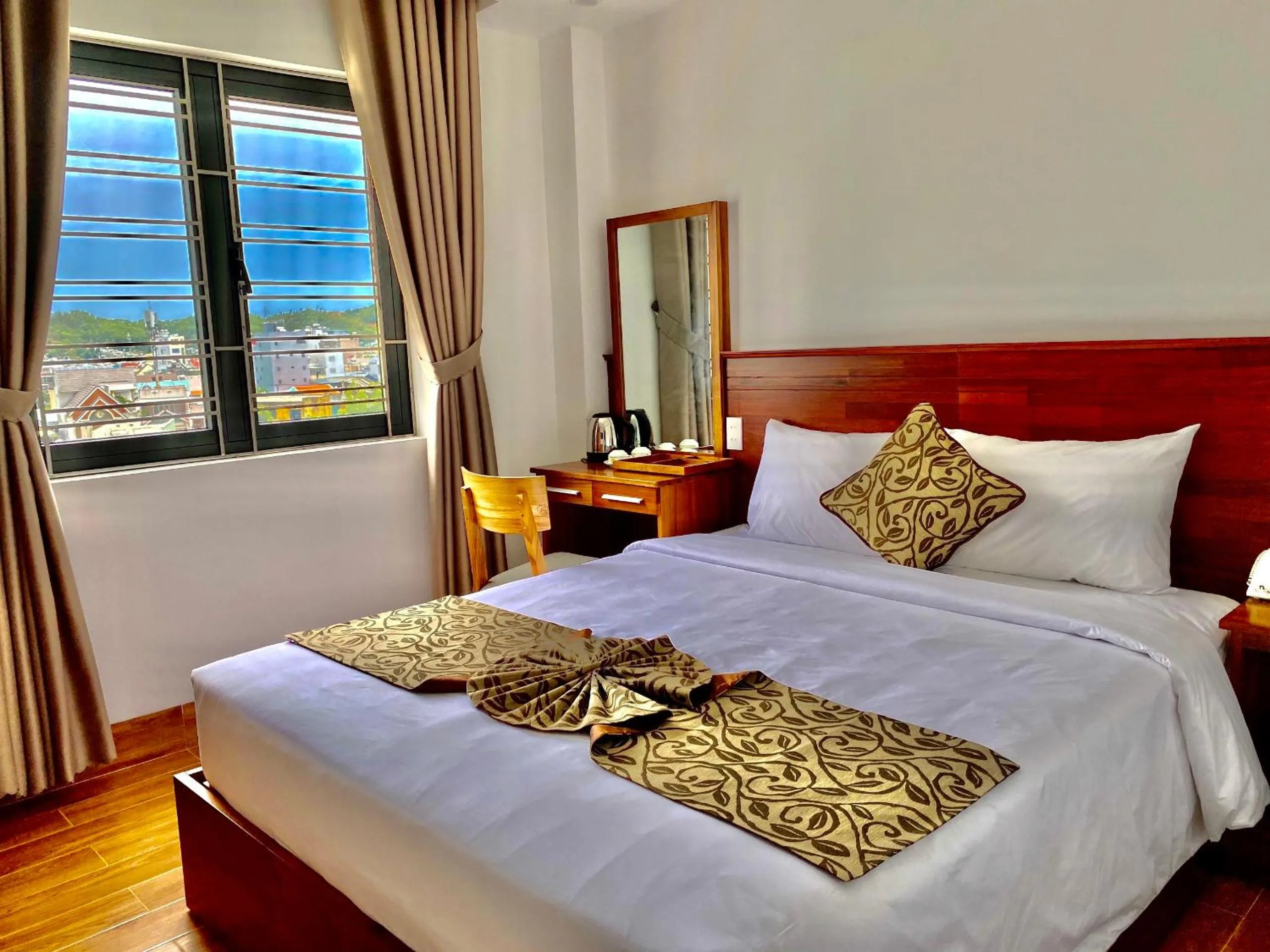 Bed in Ocean View Quy Nhon Hotel