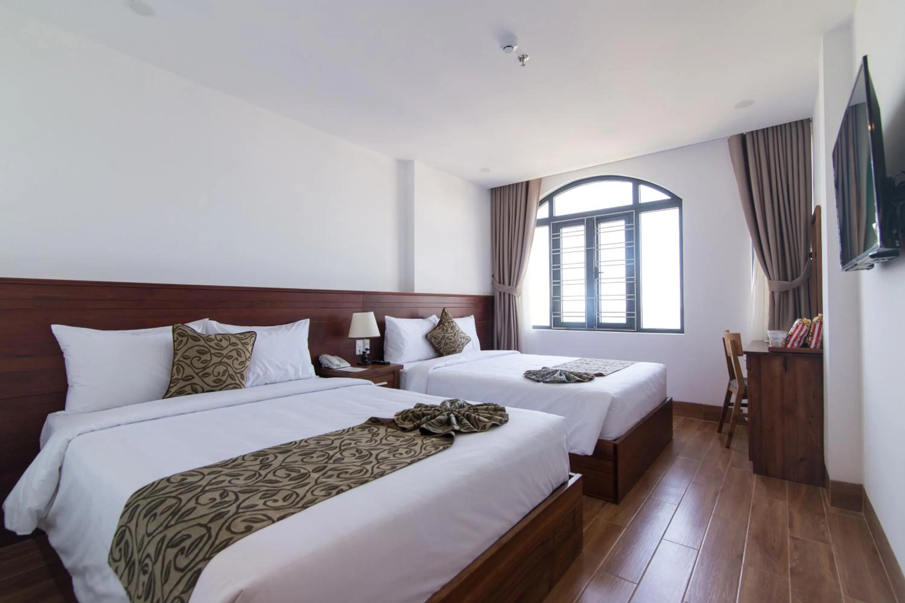 Bed in Ocean View Quy Nhon Hotel