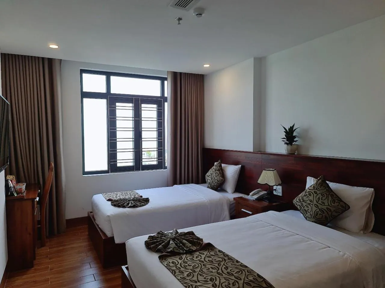 Bed in Ocean View Quy Nhon Hotel