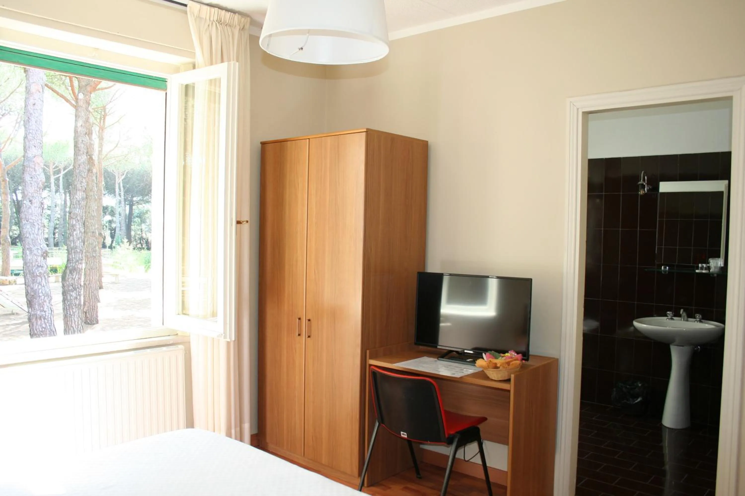 Bedroom in Hotel Villa dei Pini