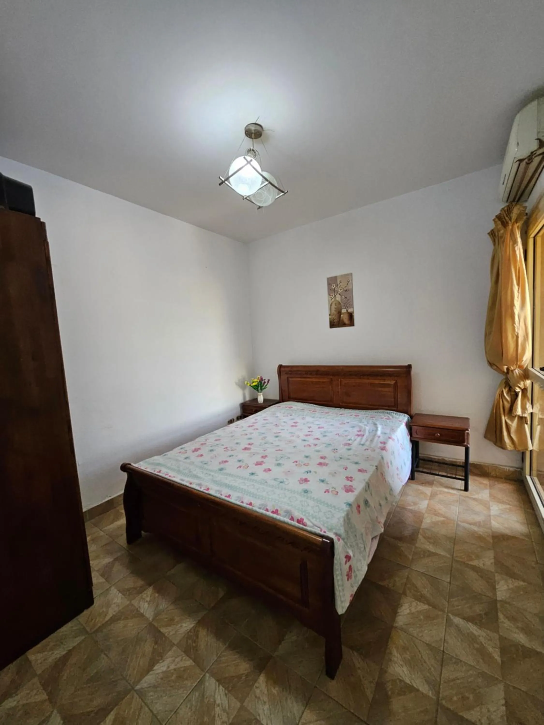 Bed in Flat in Royal Plaza Alexandria in front of El Montazah garden