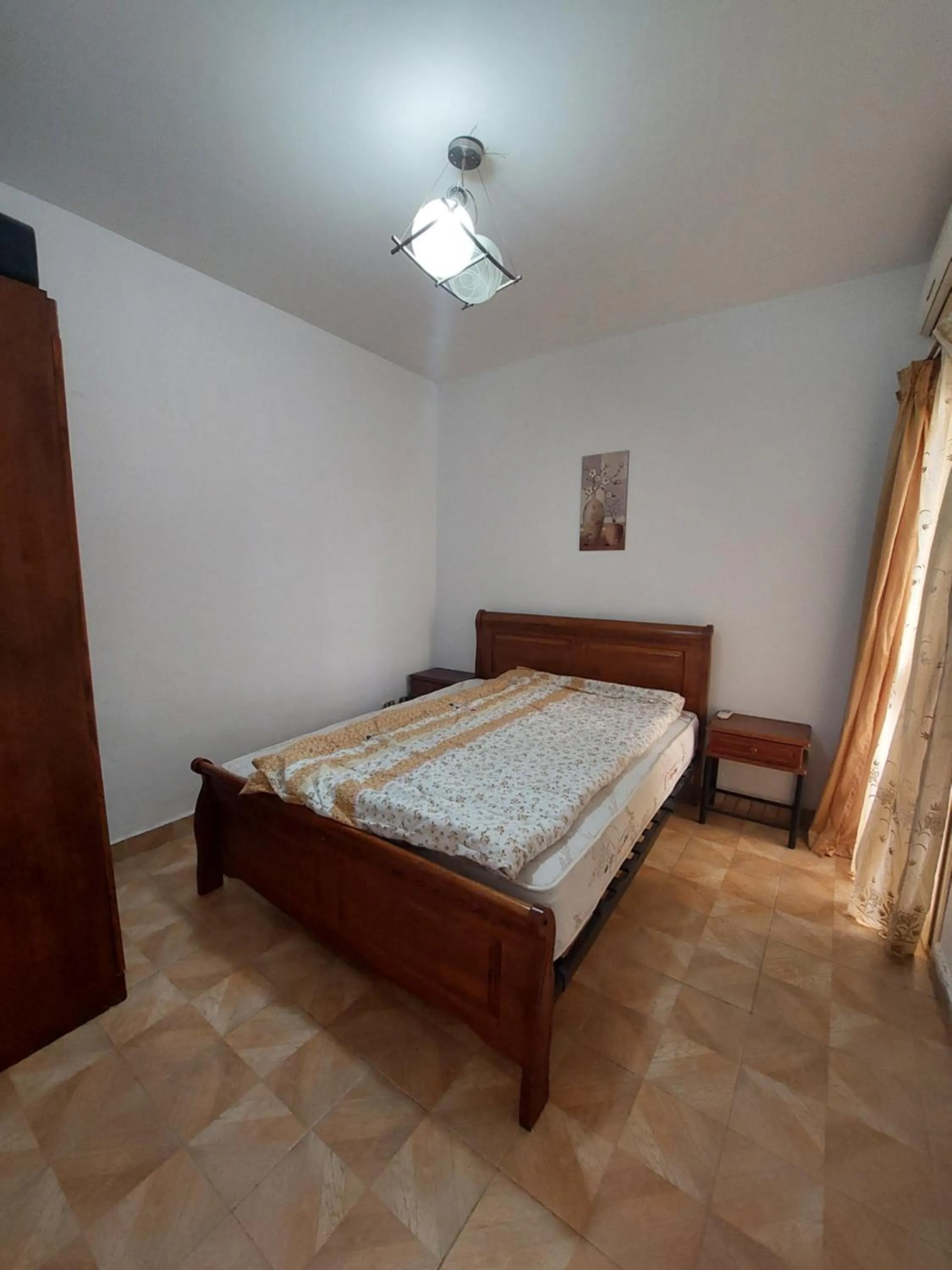 Bed in Flat in Royal Plaza Alexandria in front of El Montazah garden