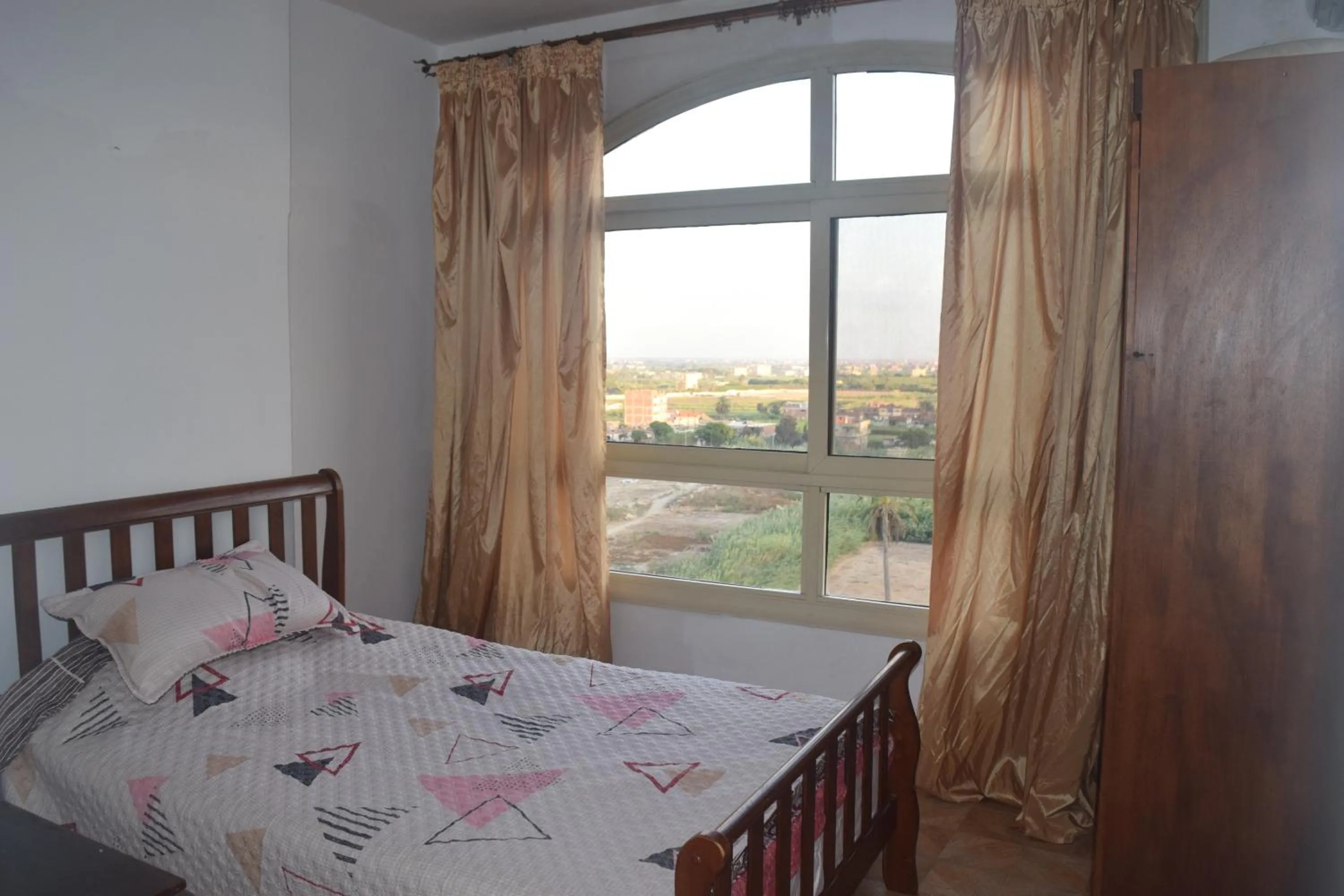 Bed in Flat in Royal Plaza Alexandria in front of El Montazah garden