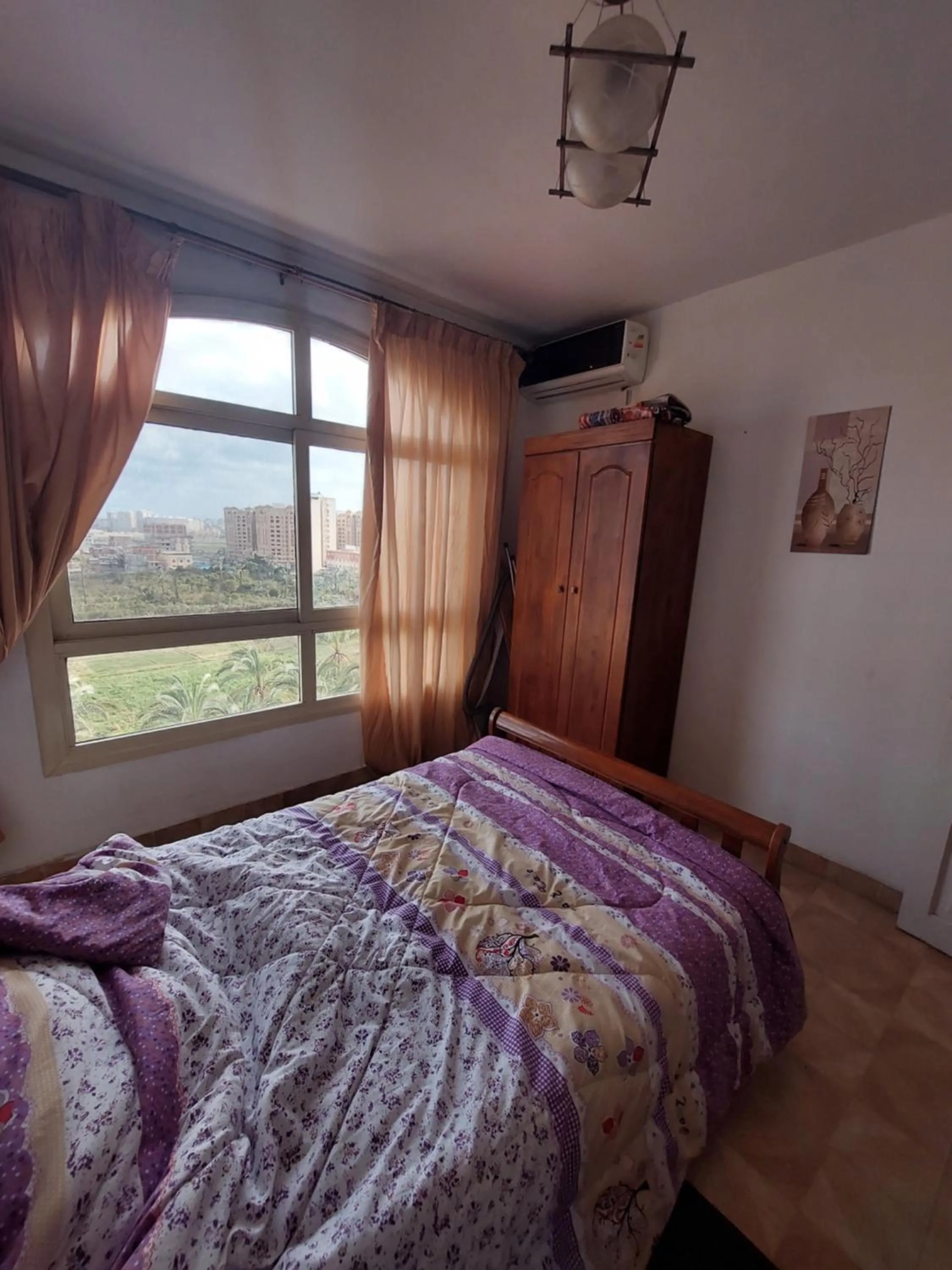 Bed in Flat in Royal Plaza Alexandria in front of El Montazah garden
