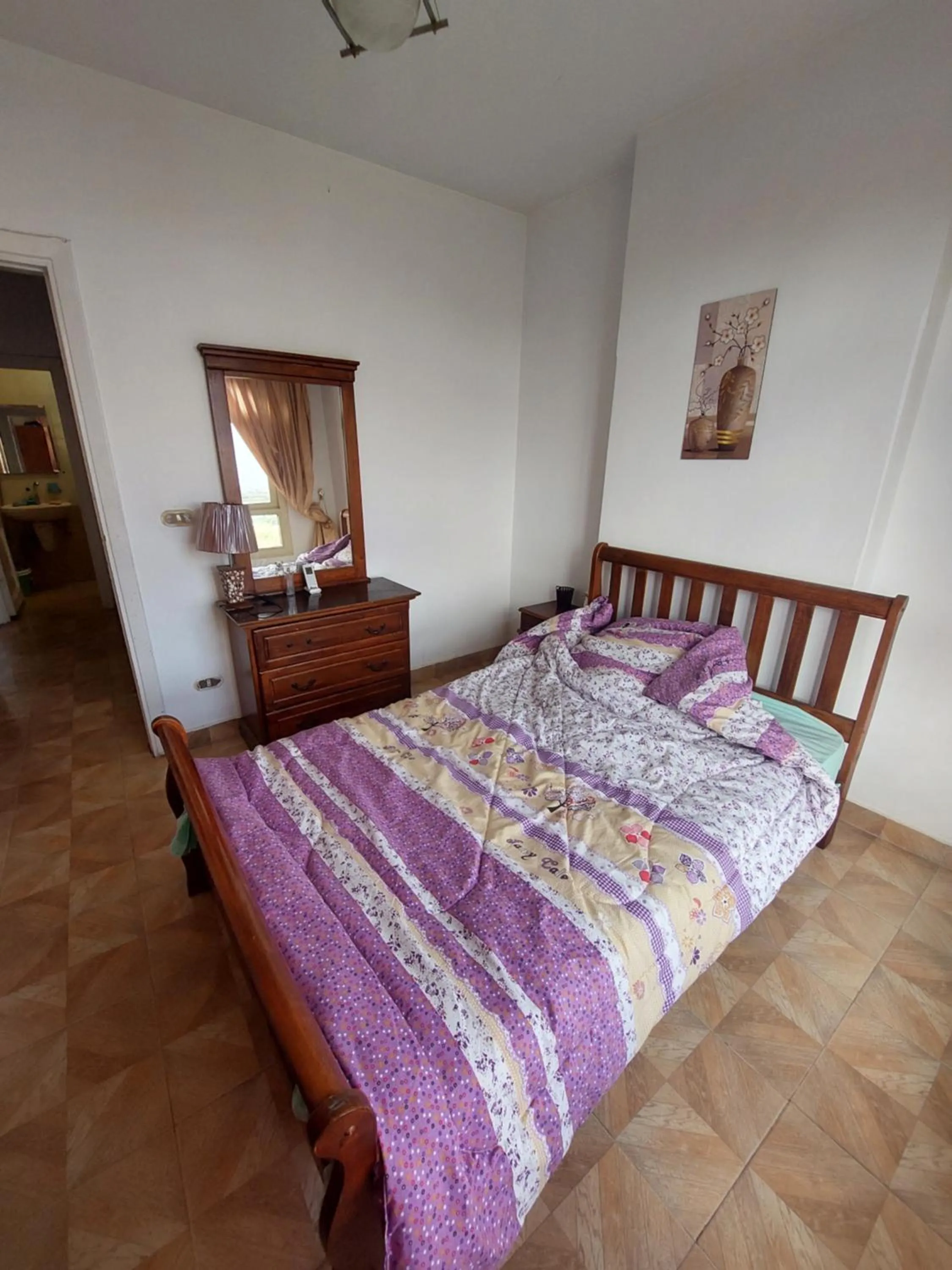 Bed in Flat in Royal Plaza Alexandria in front of El Montazah garden